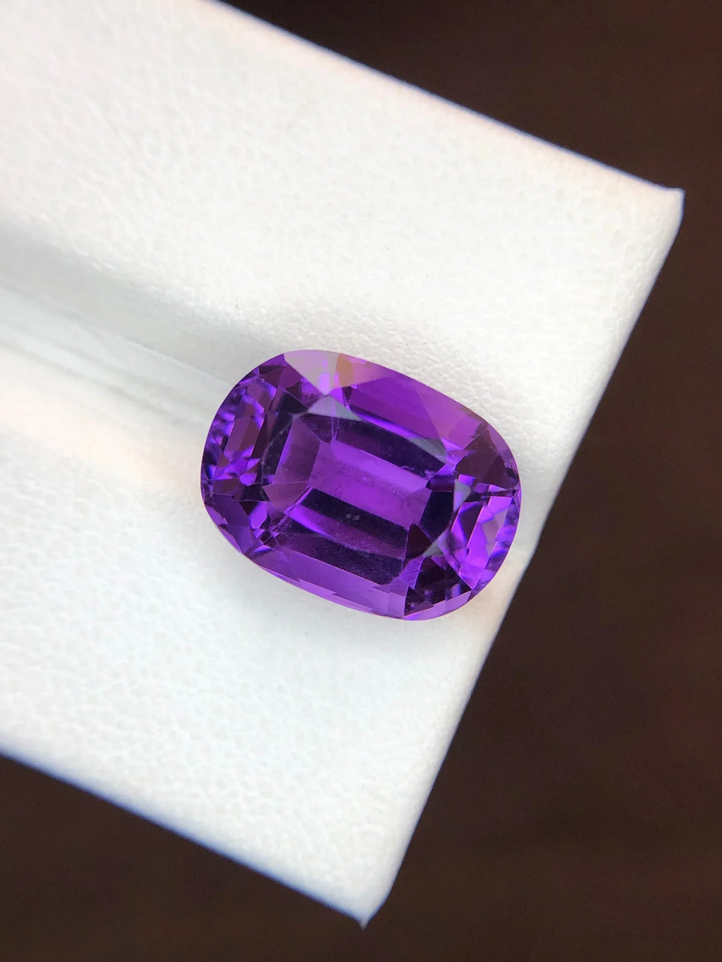 7.10 carat oval fancy cut amethyst from Brazil
