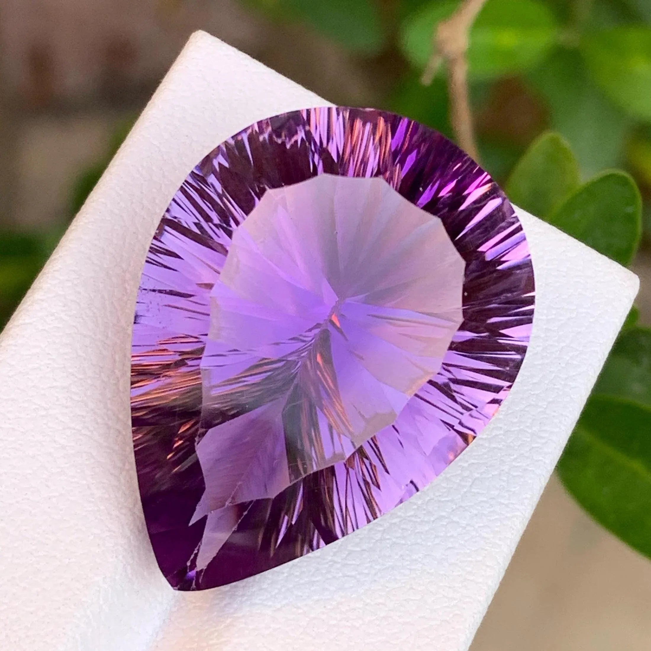 Violet amethyst crystal pear cut gemstone