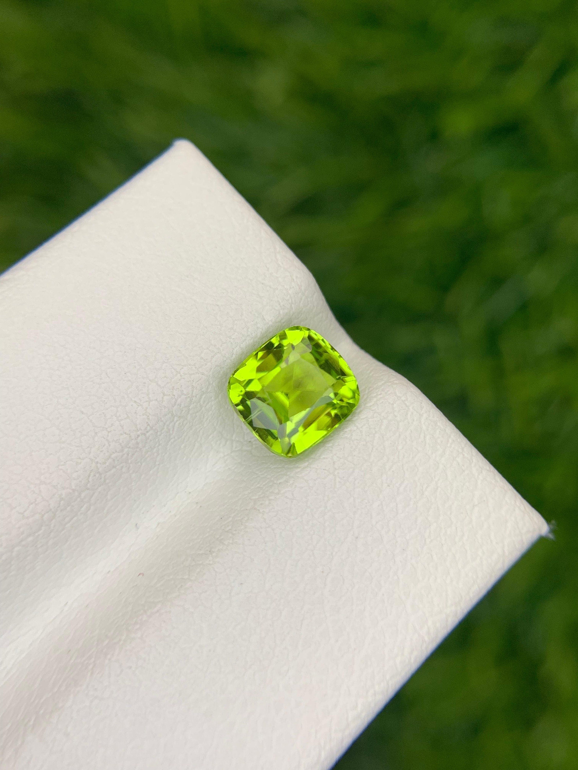 Neon Yellow Peridot: AAA Clarity, Precision Cut, 1.55 ct (6.5 x 6.2 mm)
