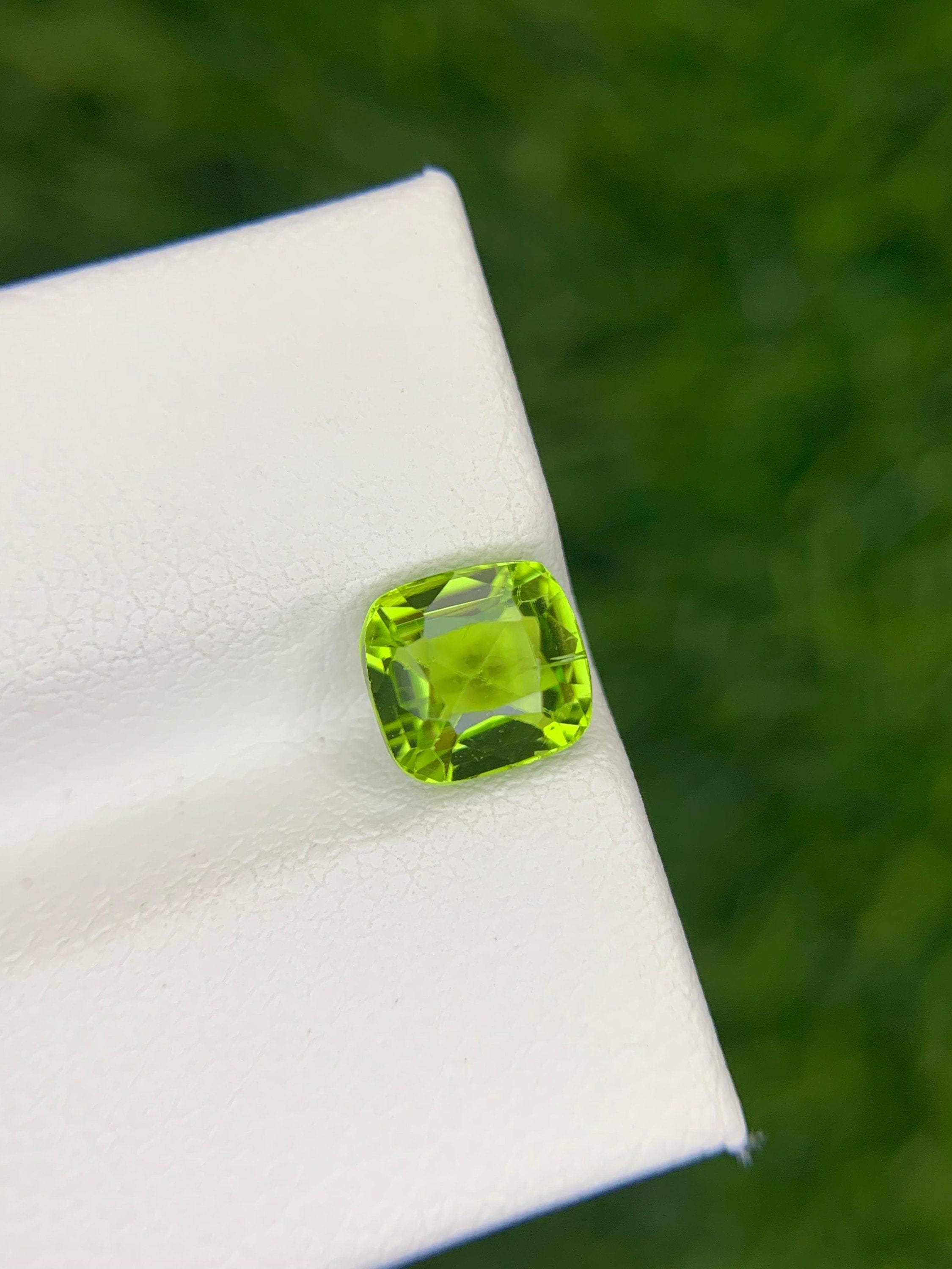 Neon Yellow Peridot: AAA Clarity, Precision Cut, 1.55 ct (6.5 x 6.2 mm) Secondary image