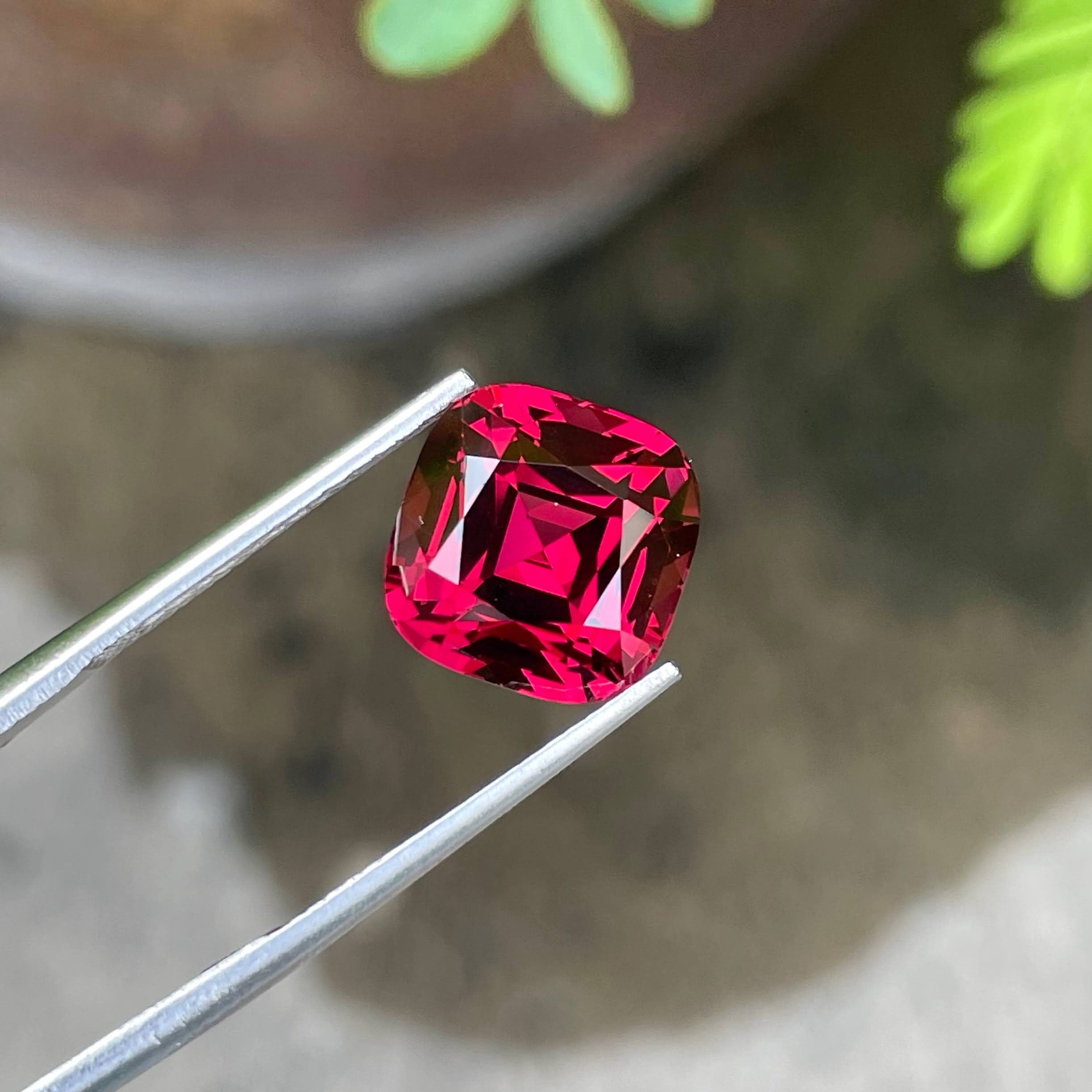 Tanzanian Pink Red Garnet: 8.46 Carat Cushion Cut Gemstone
