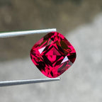 Tanzanian Pink Red Garnet: 8.46 Carat Cushion Cut Gemstone