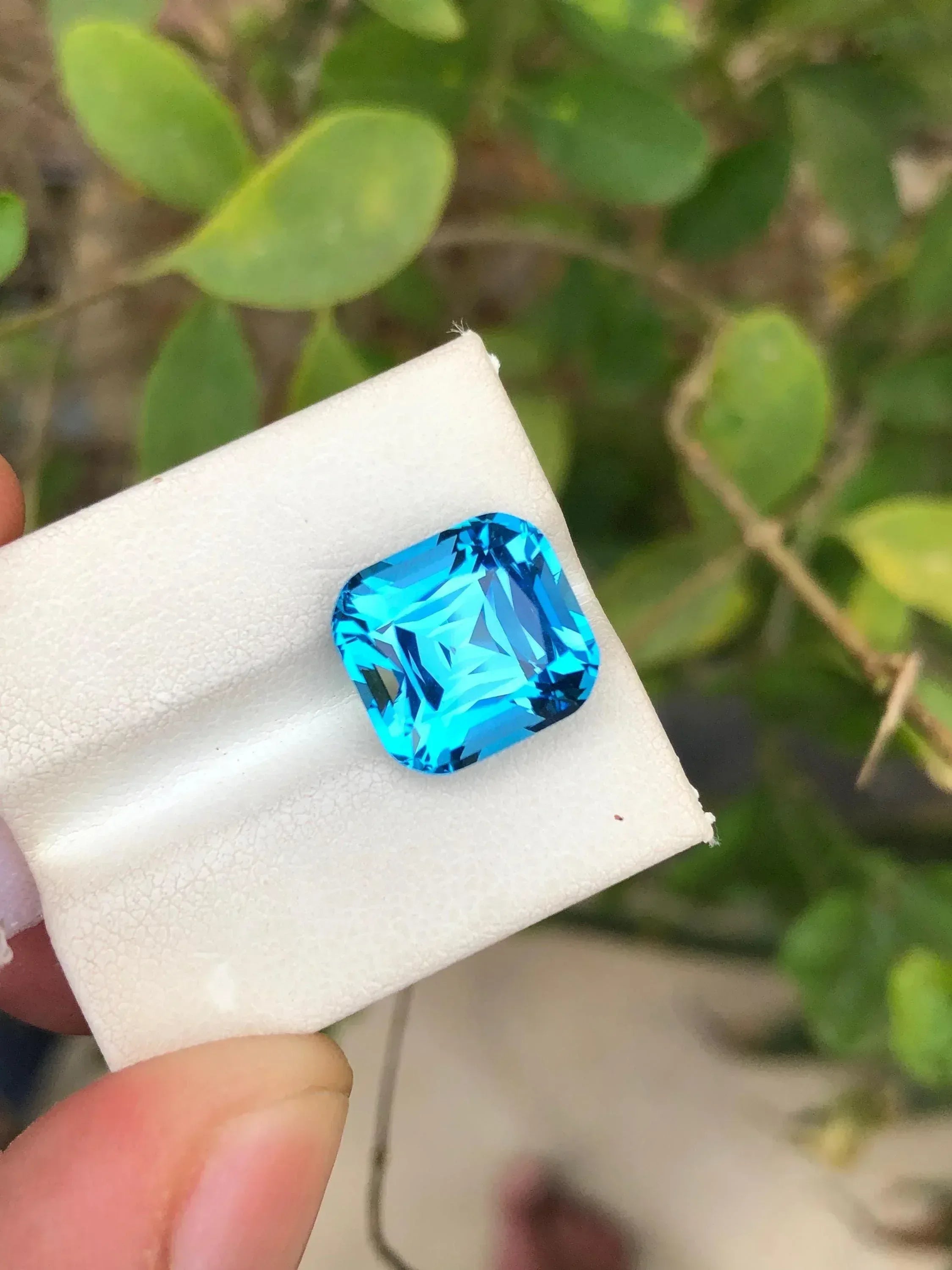 Electric Blue Topaz: 9.10 Carat Cushion Cut Gemstone Secondary image