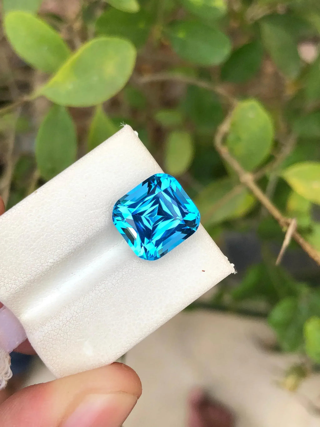 Electric Blue Topaz: 9.10 Carat Cushion Cut Gemstone - Splendor Gems
