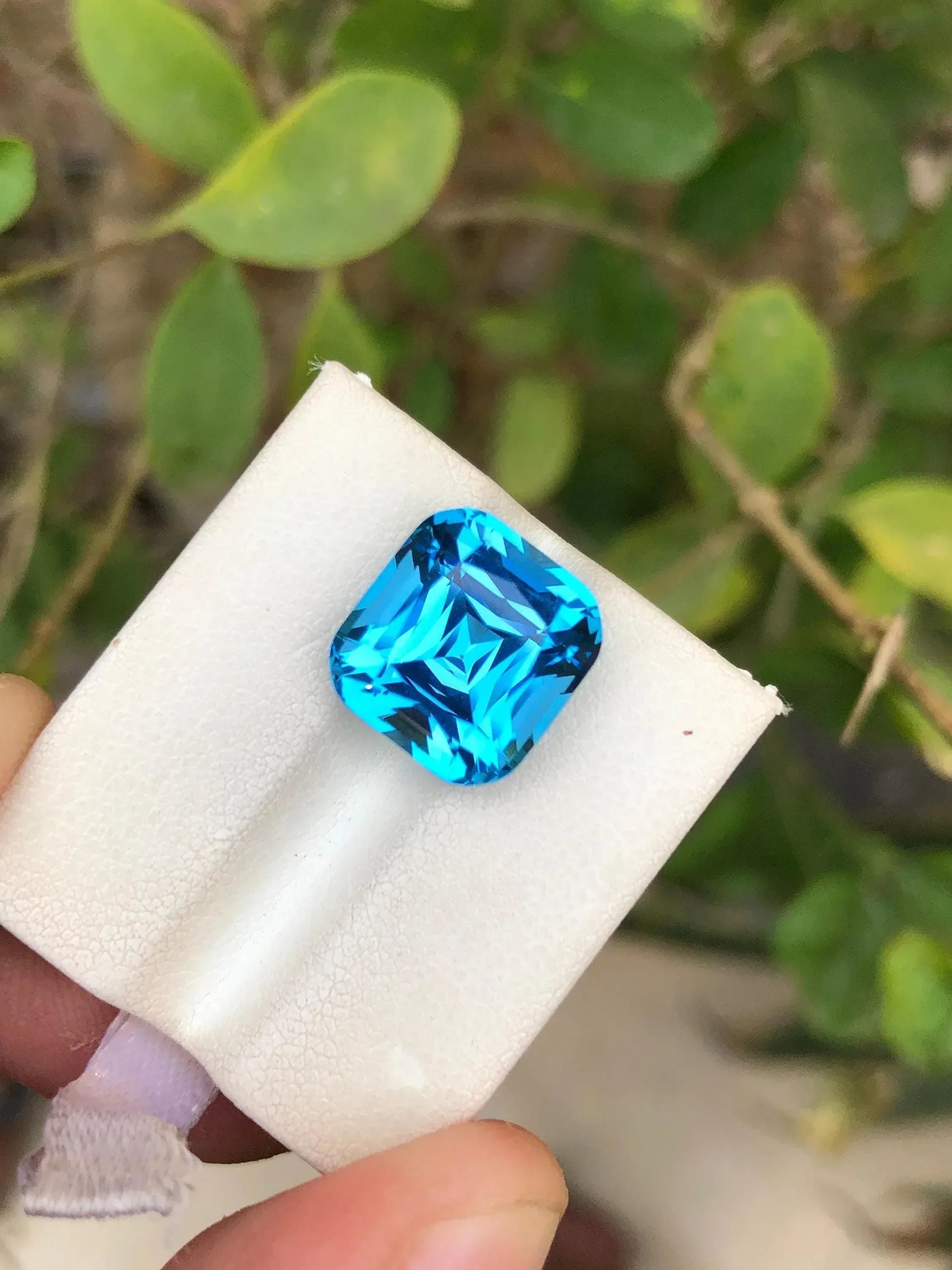 Electric Blue Topaz: 9.10 Carat Cushion Cut Gemstone - Splendor Gems Main image