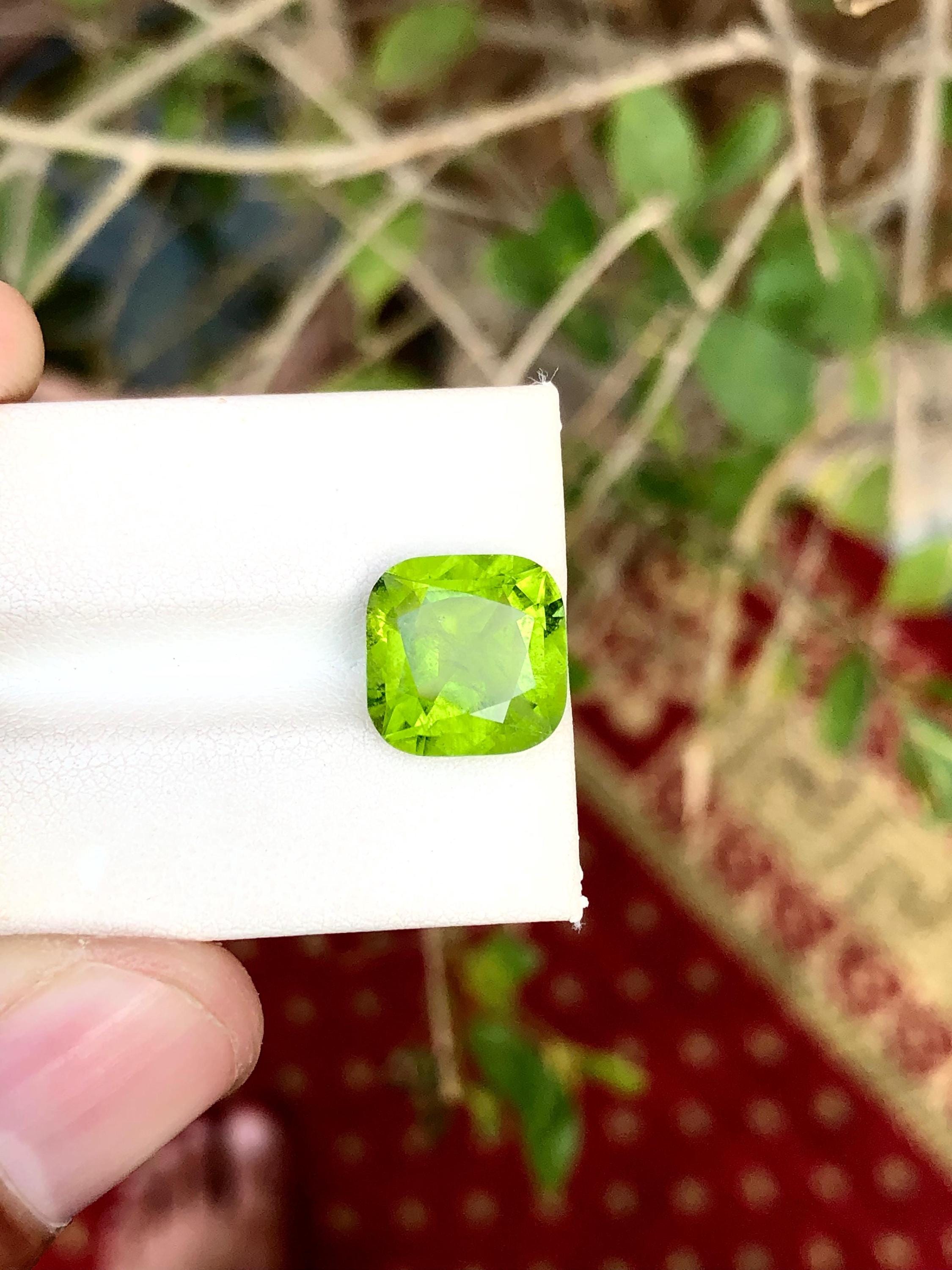 Pistachio Green Peridot Gemstone: 6.30 Carat Cushion Cut, Pakistan