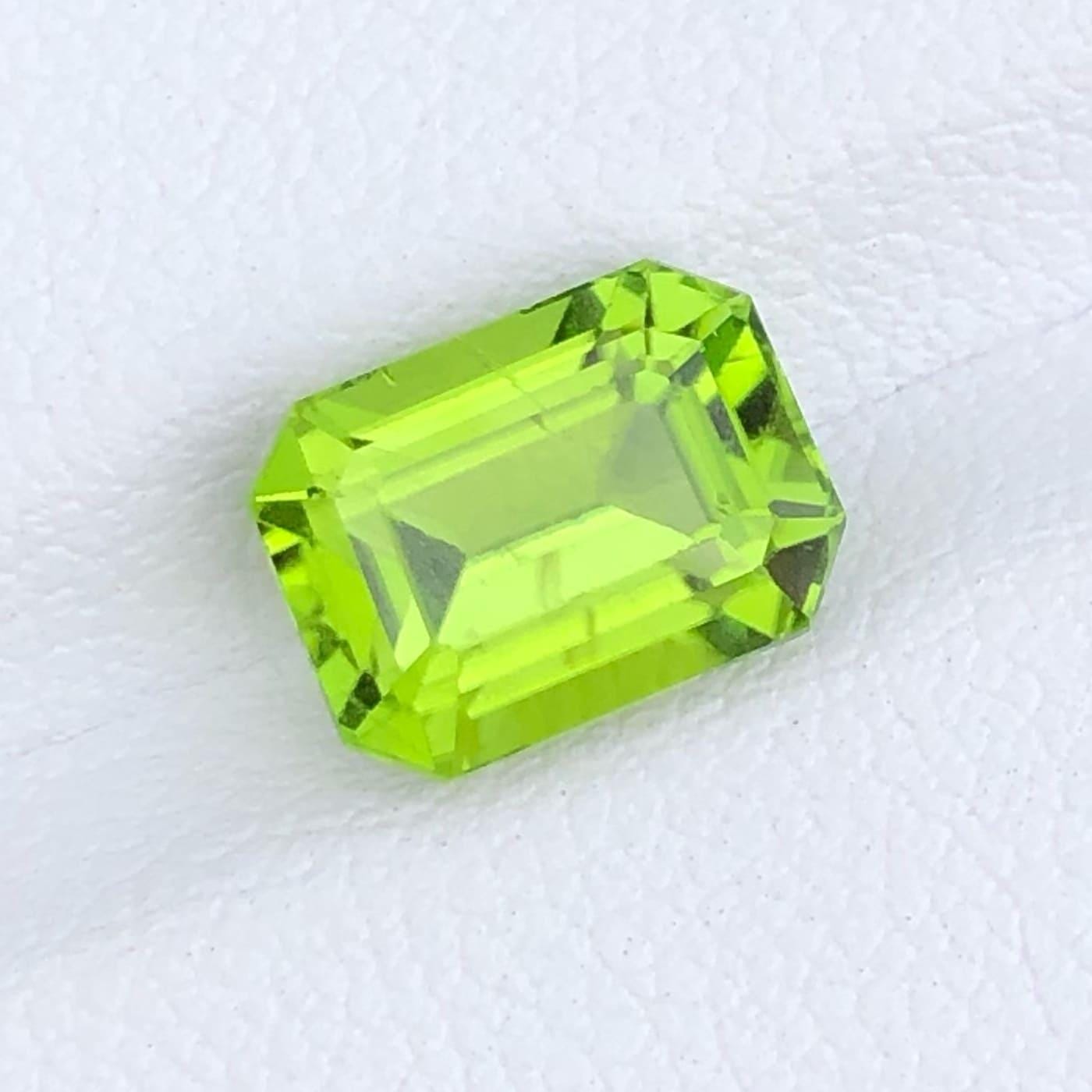 Lime Green Peridot Stone: 3.62 CTS Emerald Cut Gemstone from Pakistan