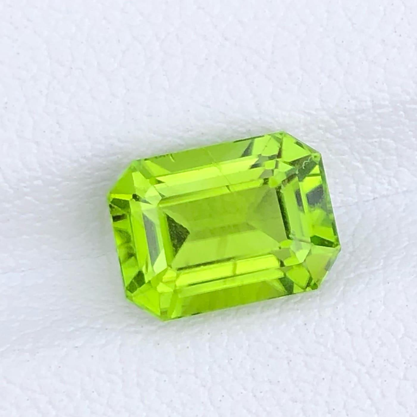 Lime Green Peridot Stone: 3.62 CTS Emerald Cut Gemstone from Pakistan