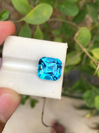 Electric Blue Topaz: 9.10 Carat Cushion Cut Gemstone - Splendor Gems