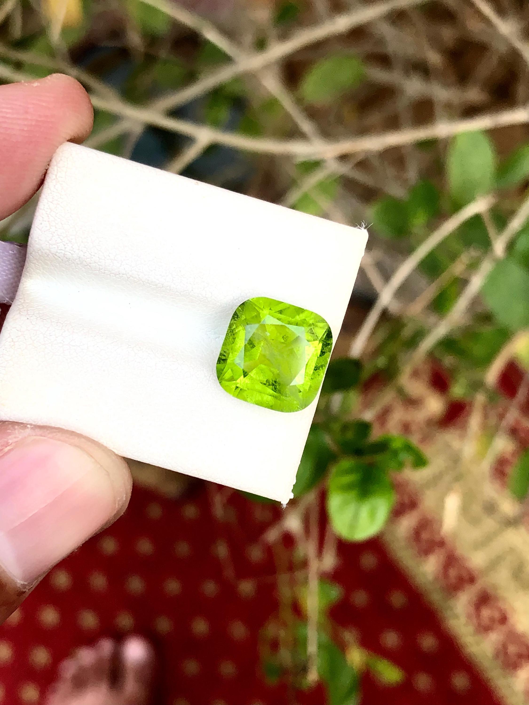 Pistachio Green Peridot Gemstone: 6.30 Carat Cushion Cut, Pakistan