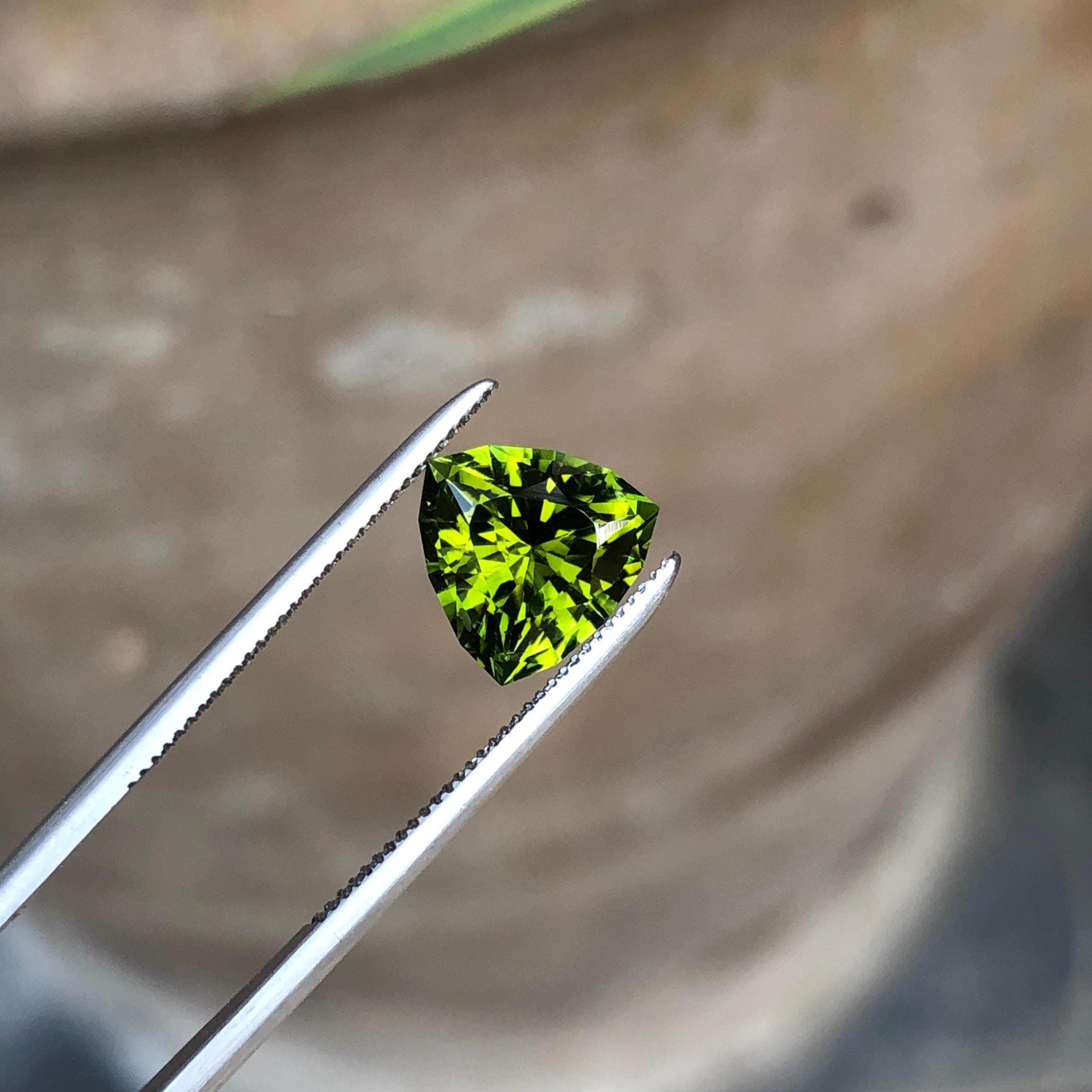 Mustard Green Tourmaline: Faceted Trillion Cut Loose Gemstone (1.80 CTS, 8.0 x 5.0 mm) Main image