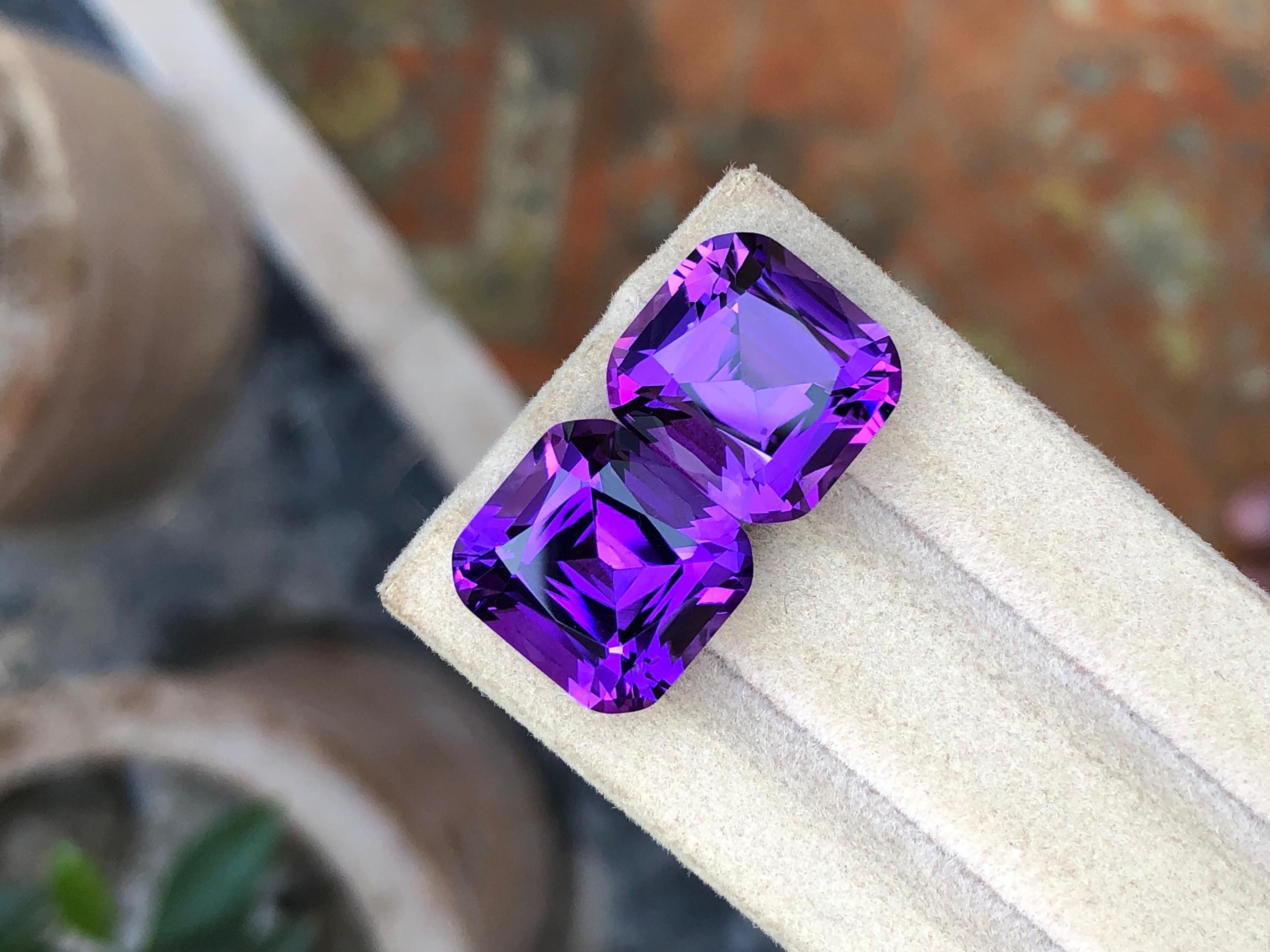 Natural Brazilian Amethyst Pair: 21.95 Carat Cushion Cut Gemstones