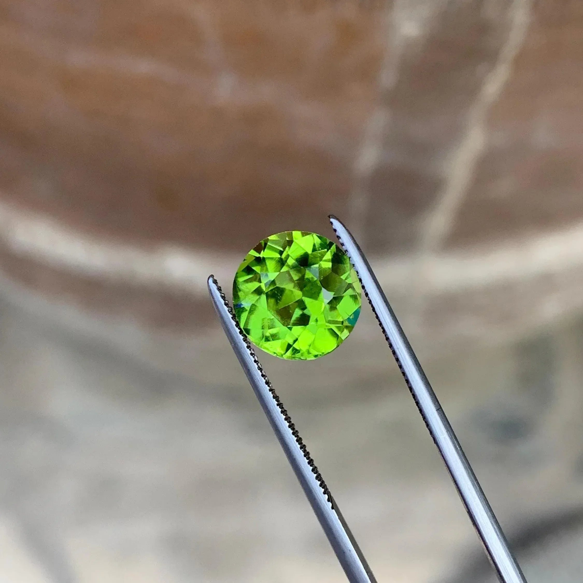 Camo Green Peridot Stone: 2.25 CTS Faceted Round Cut, August Birthstone - Splendor Gems