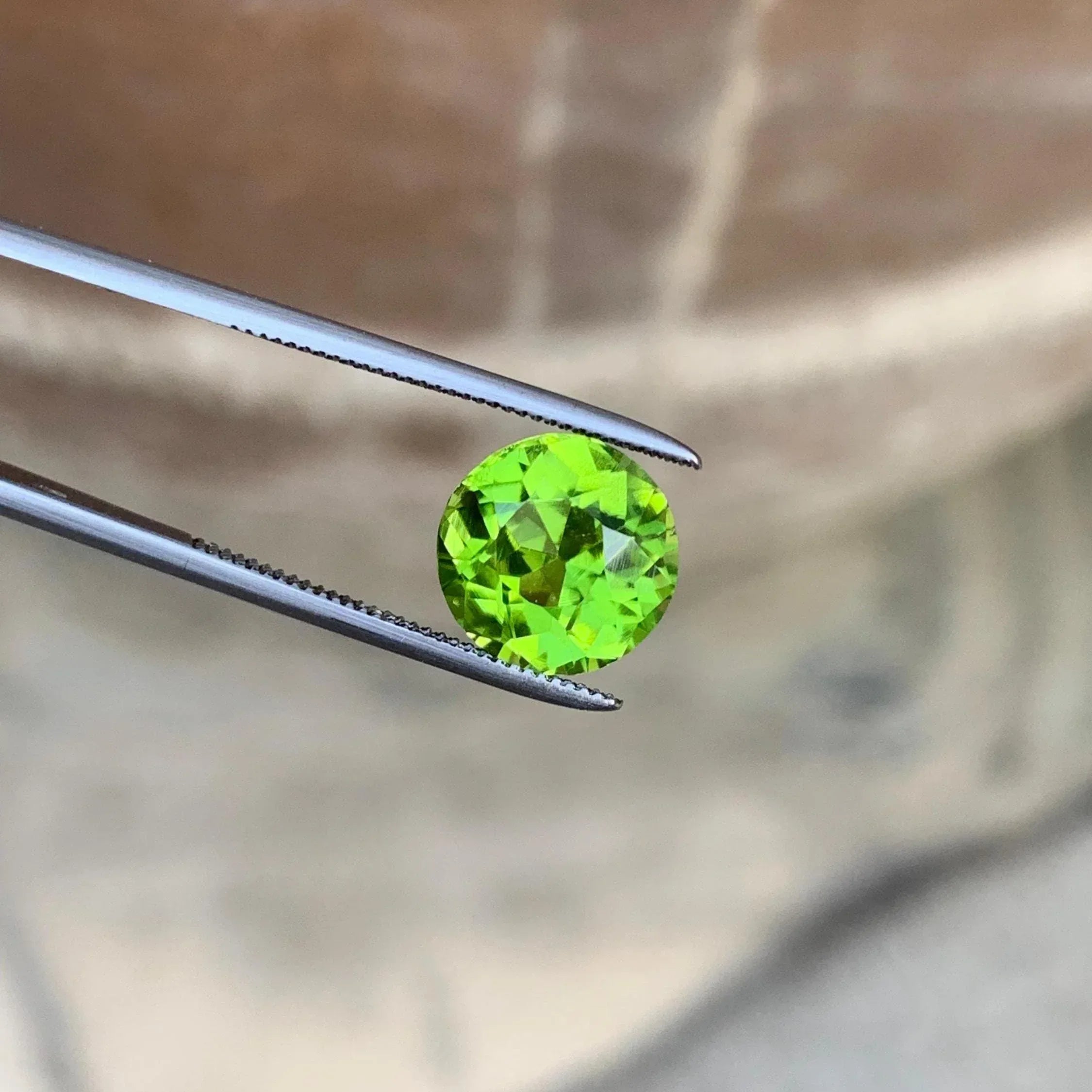 Camo Green Peridot Stone: 2.25 CTS Faceted Round Cut, August Birthstone - Splendor Gems