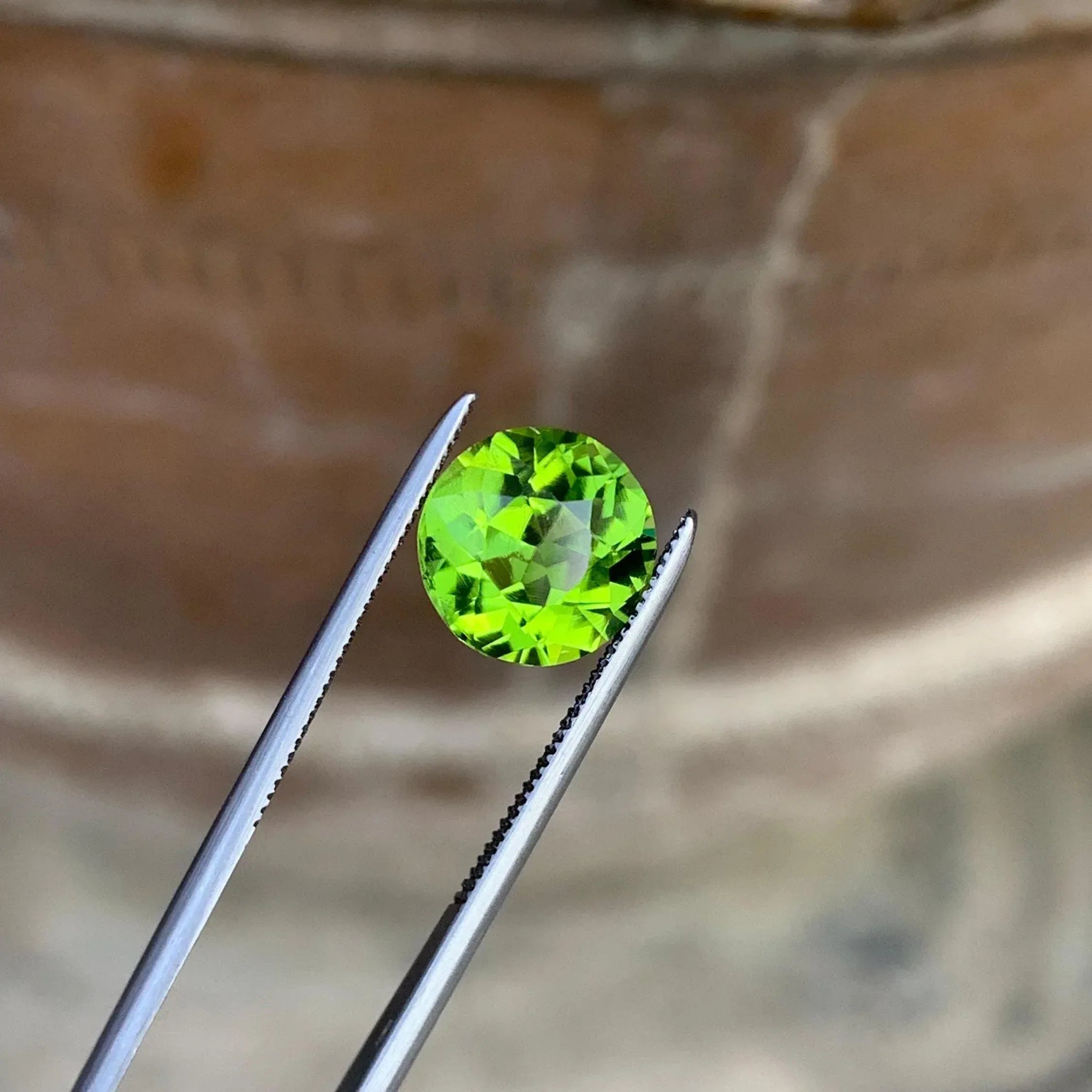 Camo Green Peridot Stone: 2.25 CTS Faceted Round Cut, August Birthstone - Splendor Gems