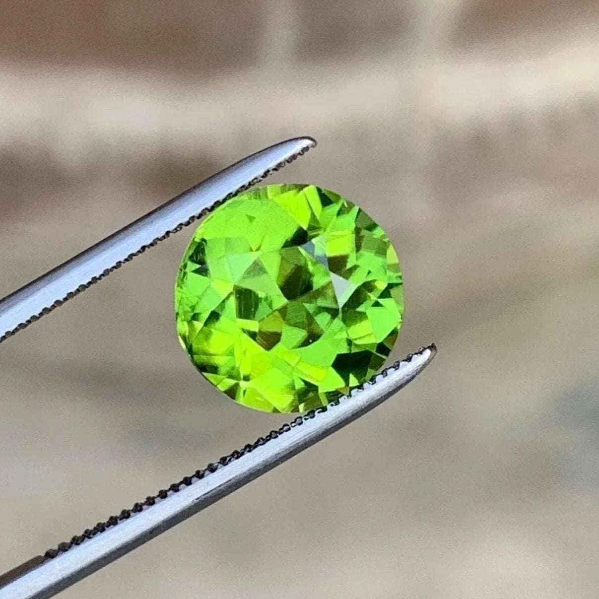 Camo Green Peridot Stone: 2.25 CTS Faceted Round Cut, August Birthstone - Splendor Gems Main image