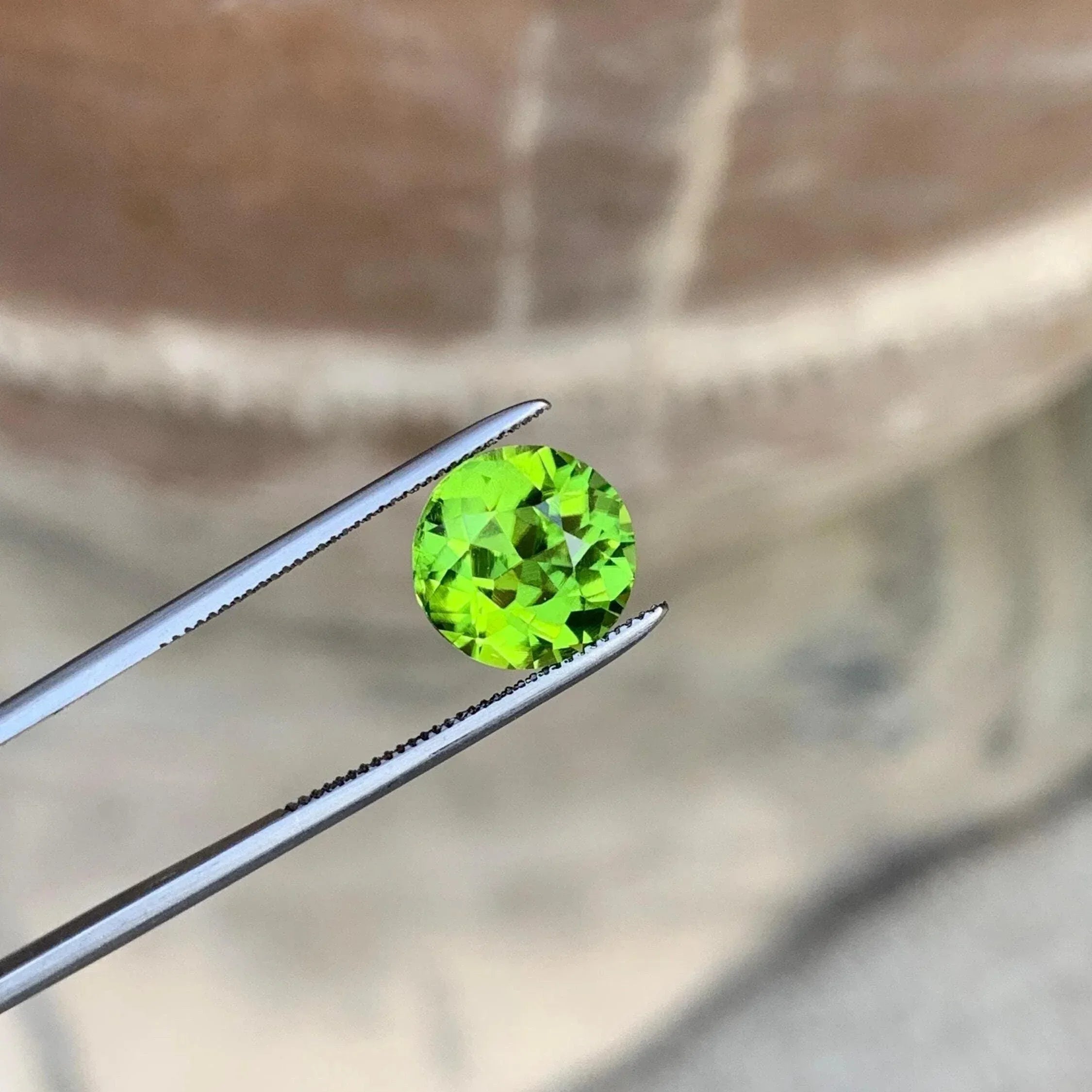 Camo Green Peridot Stone: 2.25 CTS Faceted Round Cut, August Birthstone - Splendor Gems