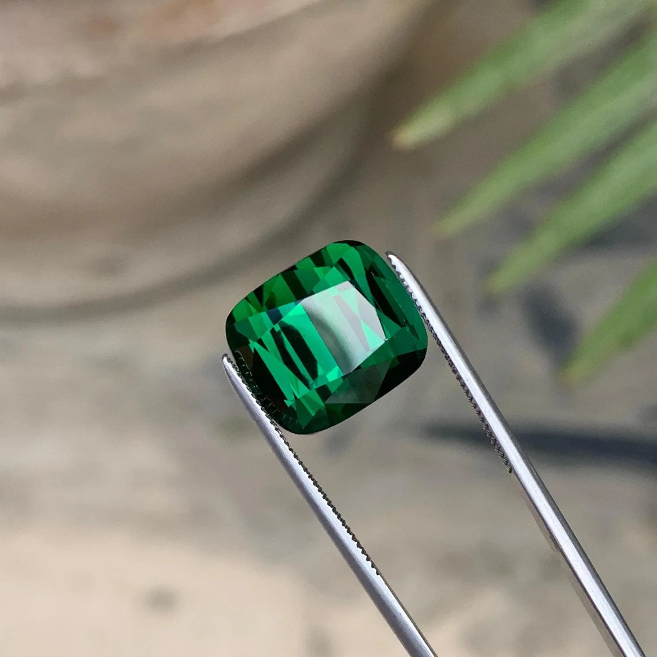 Deep Green Tourmaline: 11.70 ct Cushion Cut Gemstone from Afghanistan - Splendor Gems