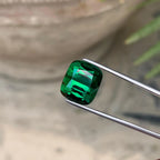 Deep Green Tourmaline: 11.70 ct Cushion Cut Gemstone from Afghanistan - Splendor Gems