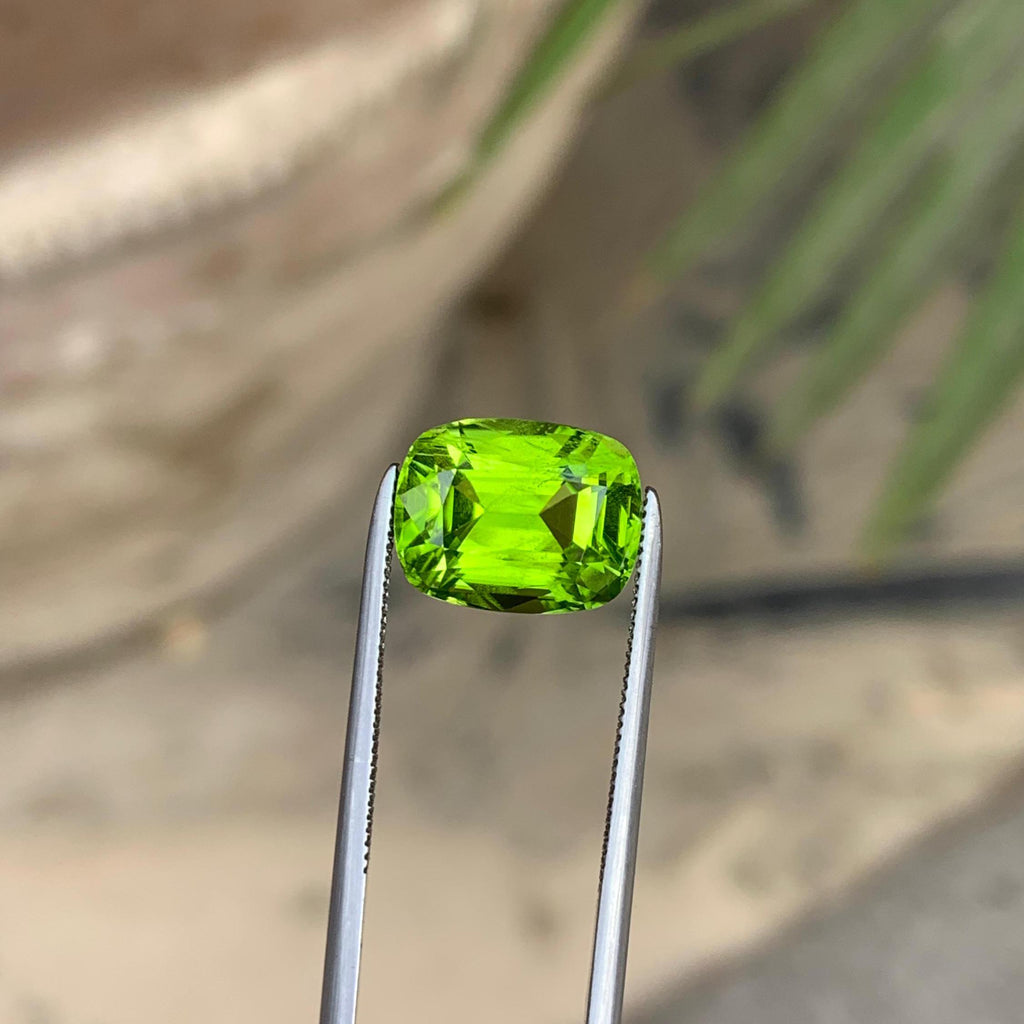 Venom Green Peridot Stone: 4.95 ct Faceted Cushion Cut, Pakistan Origin