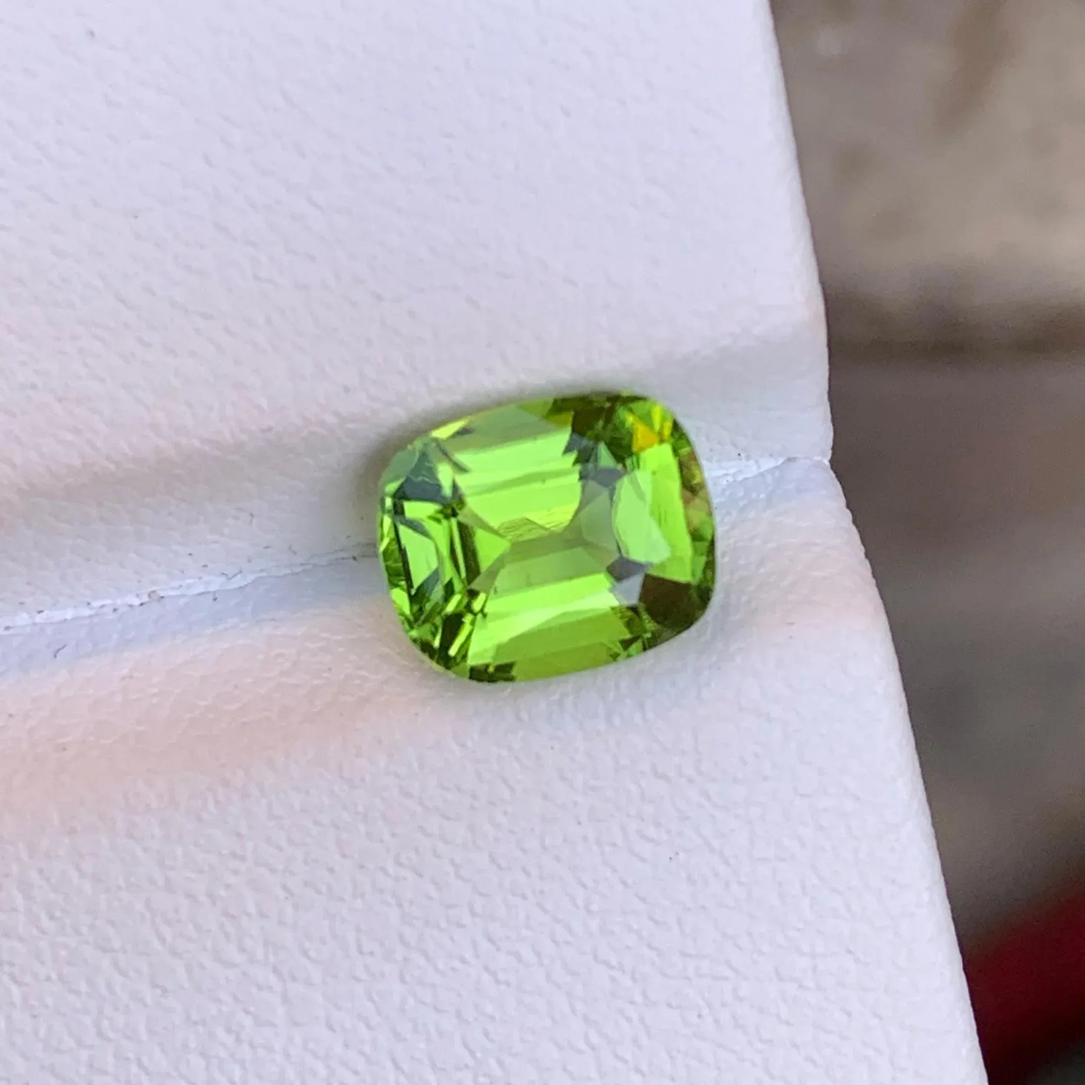 Apple Green Peridot Stone: 2.55 CTS Cushion Cut, Pakistan Origin - Splendor Gems