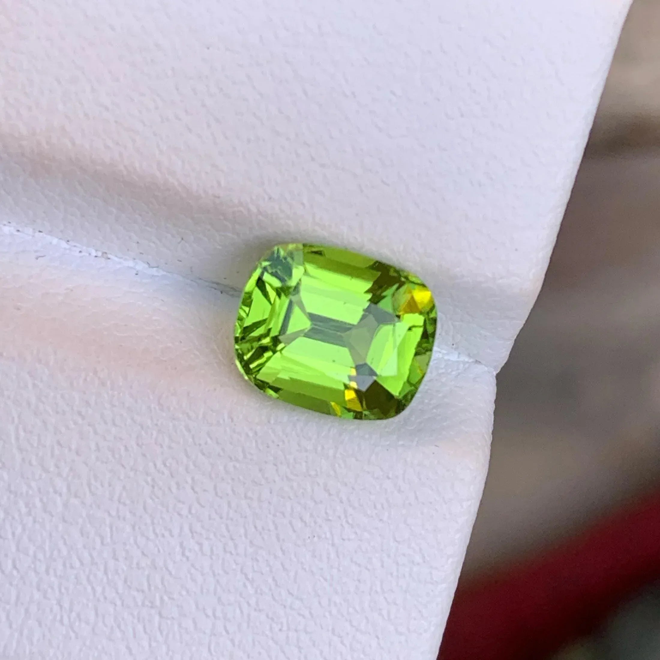 Apple Green Peridot Stone: 2.55 CTS Cushion Cut, Pakistan Origin - Splendor Gems