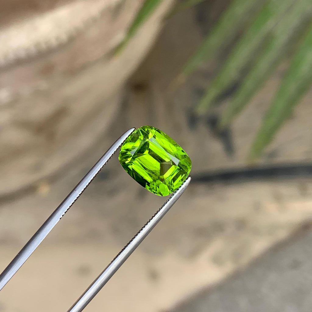 Venom Green Peridot Stone: 4.95 ct Faceted Cushion Cut, Pakistan Origin