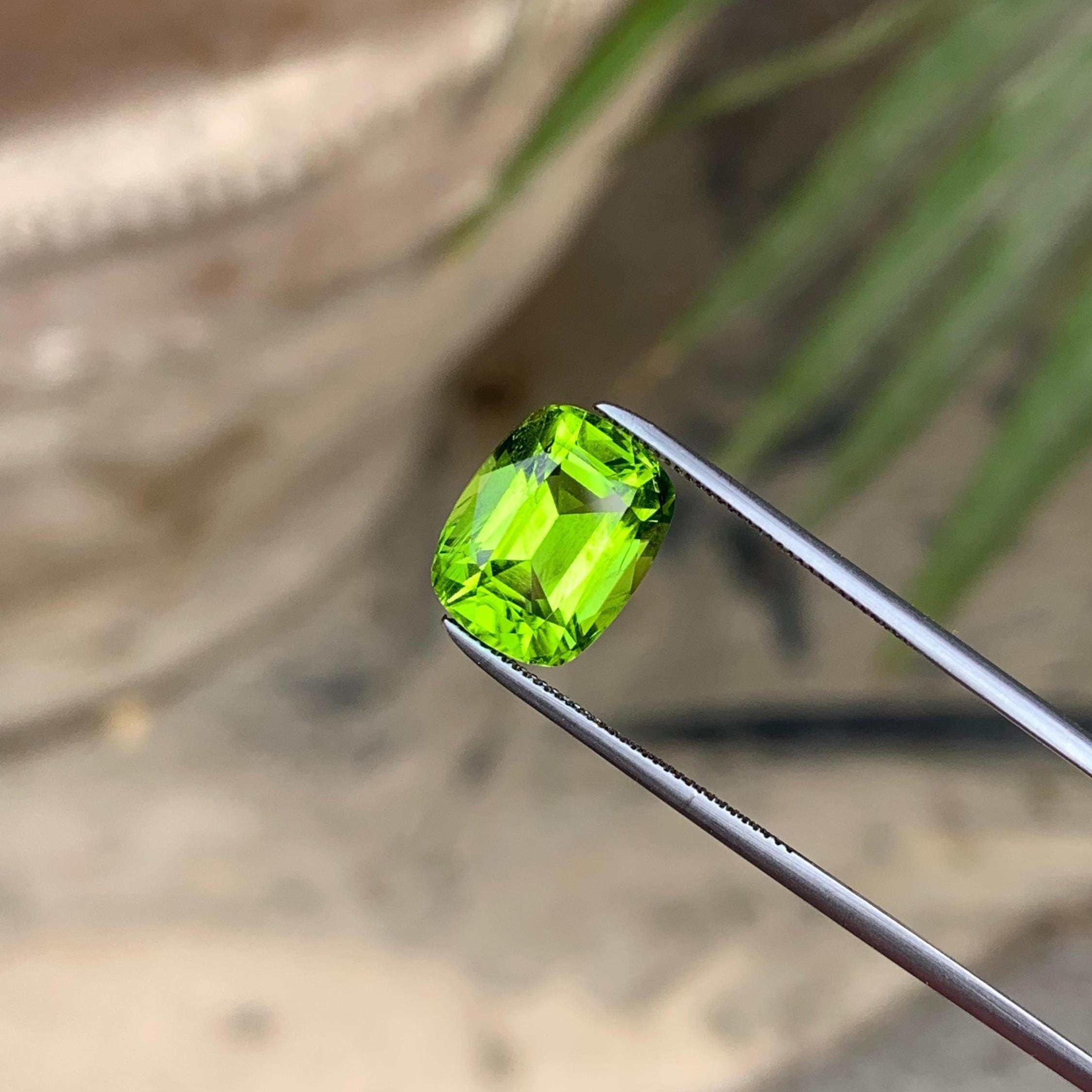 Venom Green Peridot Stone: 4.95 ct Faceted Cushion Cut, Pakistan Origin Main image