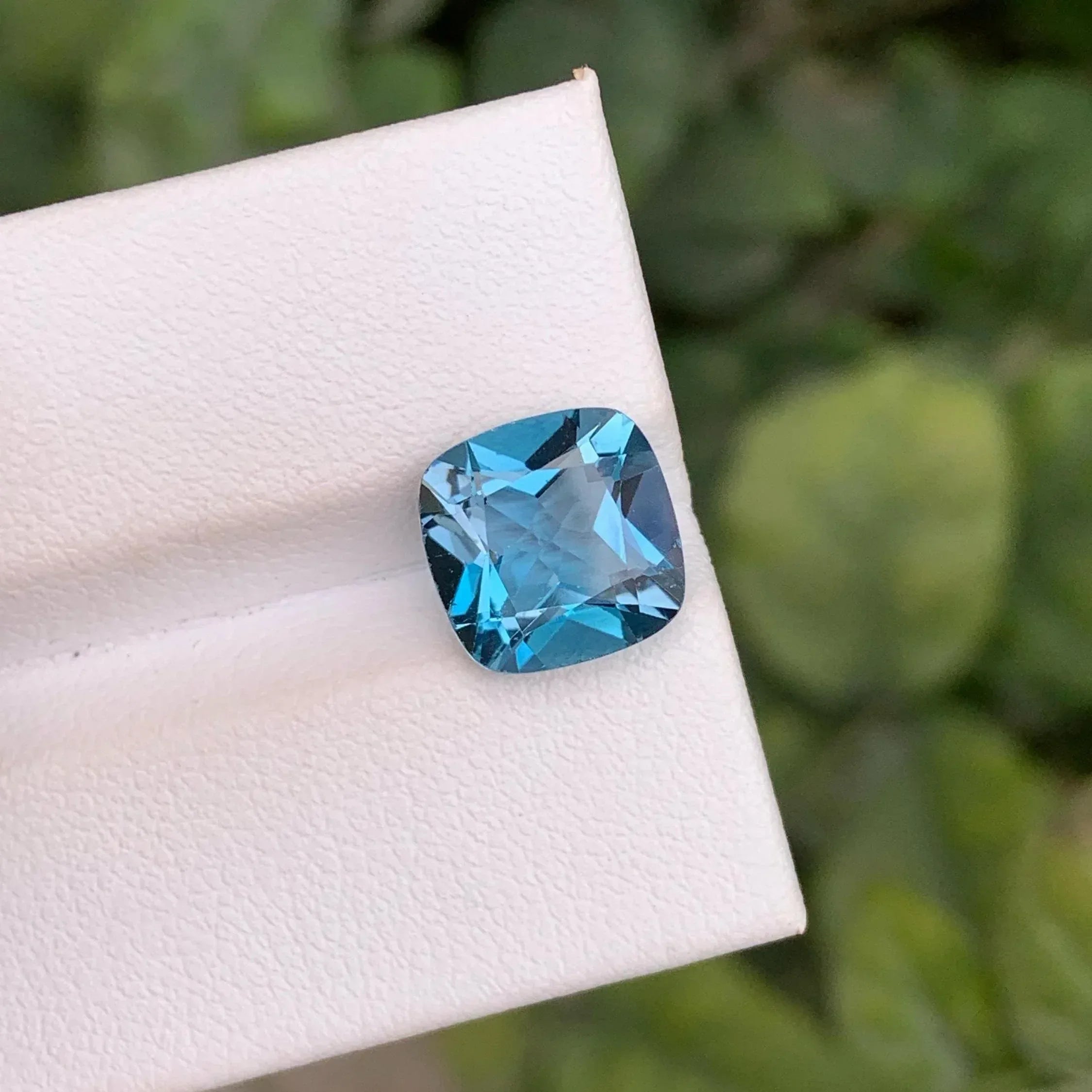 Faceted London Blue Topaz: 4.90 Carat Cushion Cut Gemstone - Splendor Gems