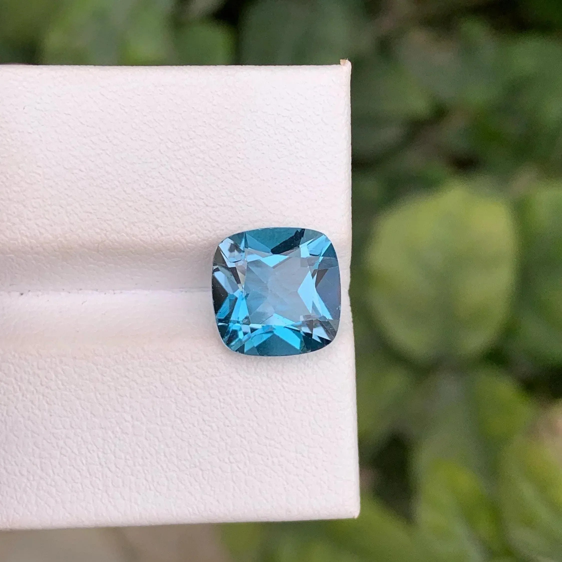 Faceted London Blue Topaz: 4.90 Carat Cushion Cut Gemstone - Splendor Gems