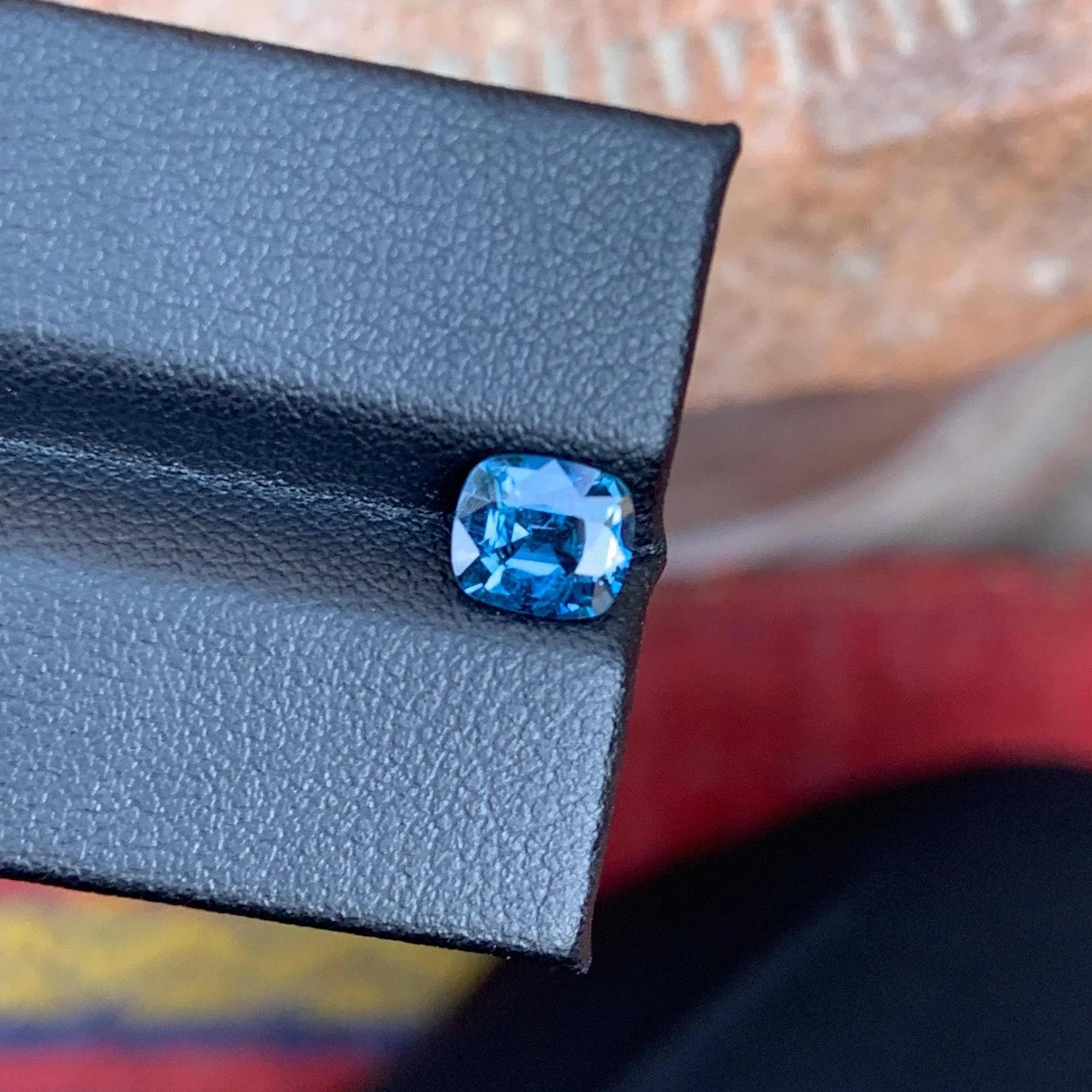 1.70 Carat Faded Blue Spinel Gemstone: Cushion Cut, Burmese Origin - Splendor Gems
