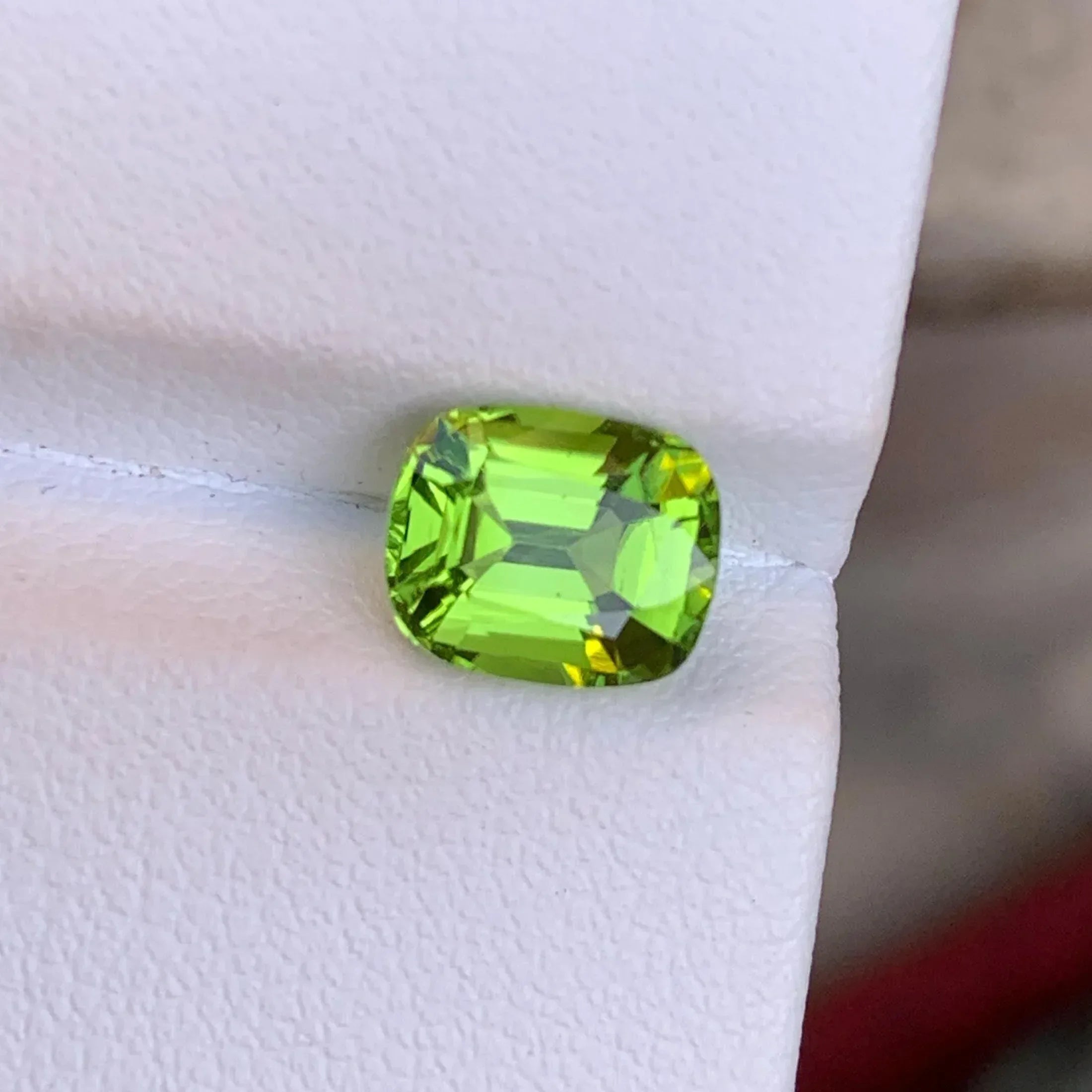 Apple Green Peridot Stone: 2.55 CTS Cushion Cut, Pakistan Origin - Splendor Gems