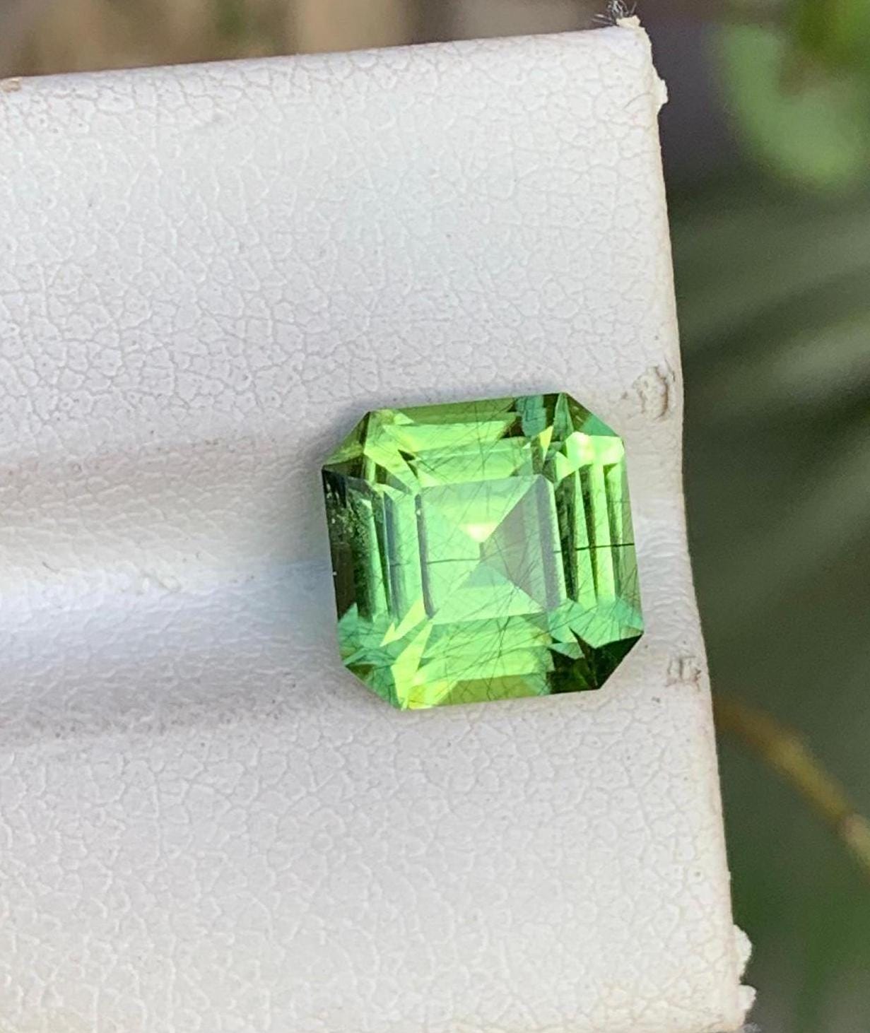 Natural Peridot Gemstone: 3 Carat Faceted Asscher Cut with Needle Inclusion