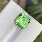 Natural Peridot Gemstone: 3 Carat Faceted Asscher Cut with Needle Inclusion