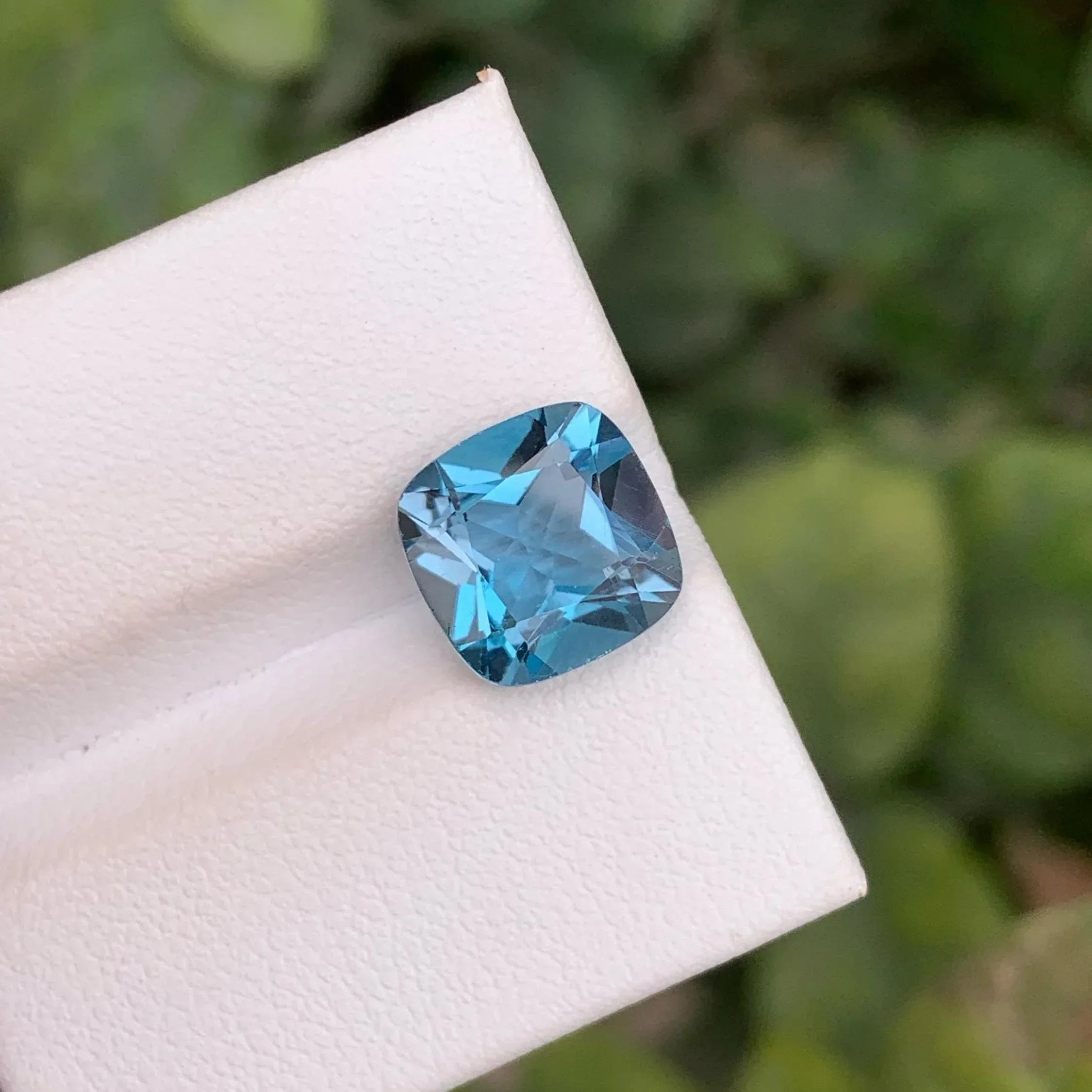 Faceted London Blue Topaz: 4.90 Carat Cushion Cut Gemstone - Splendor Gems