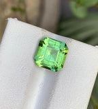 Natural Peridot Gemstone: 3 Carat Faceted Asscher Cut with Needle Inclusion