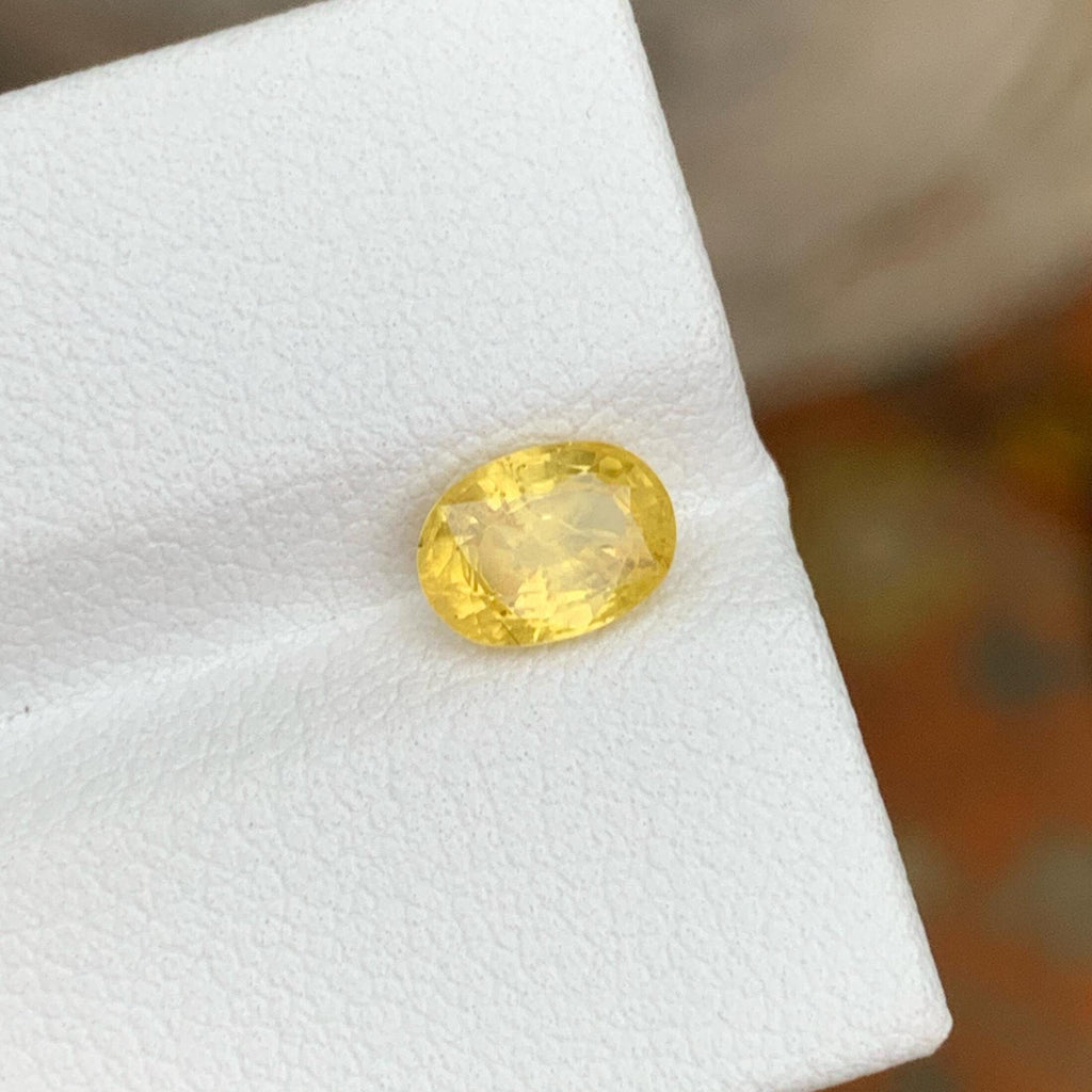 Marigold Yellow Sapphire: 1.20 CT, Faceted Oval Cut, Sri Lanka