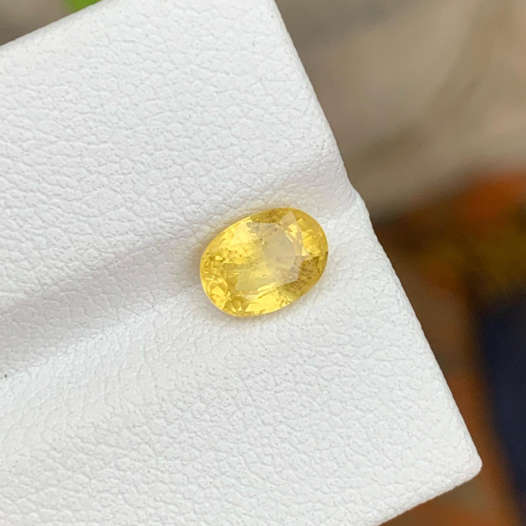 Marigold Yellow Sapphire: 1.20 CT, Faceted Oval Cut, Sri Lanka