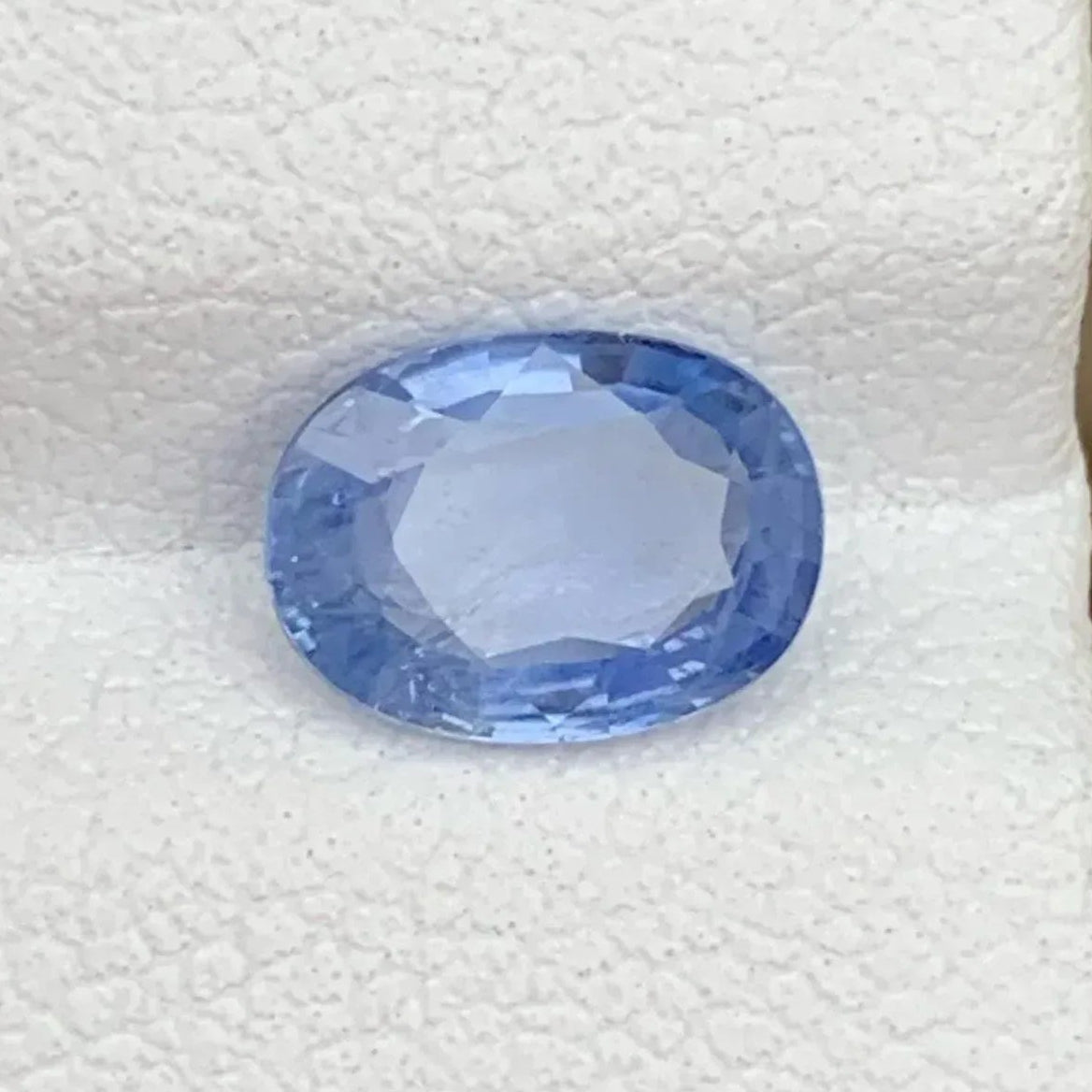 Baby Blue Sapphire Gemstone: 1.25 CT, Oval Faceted, Sri Lanka - Splendor Gems Main image