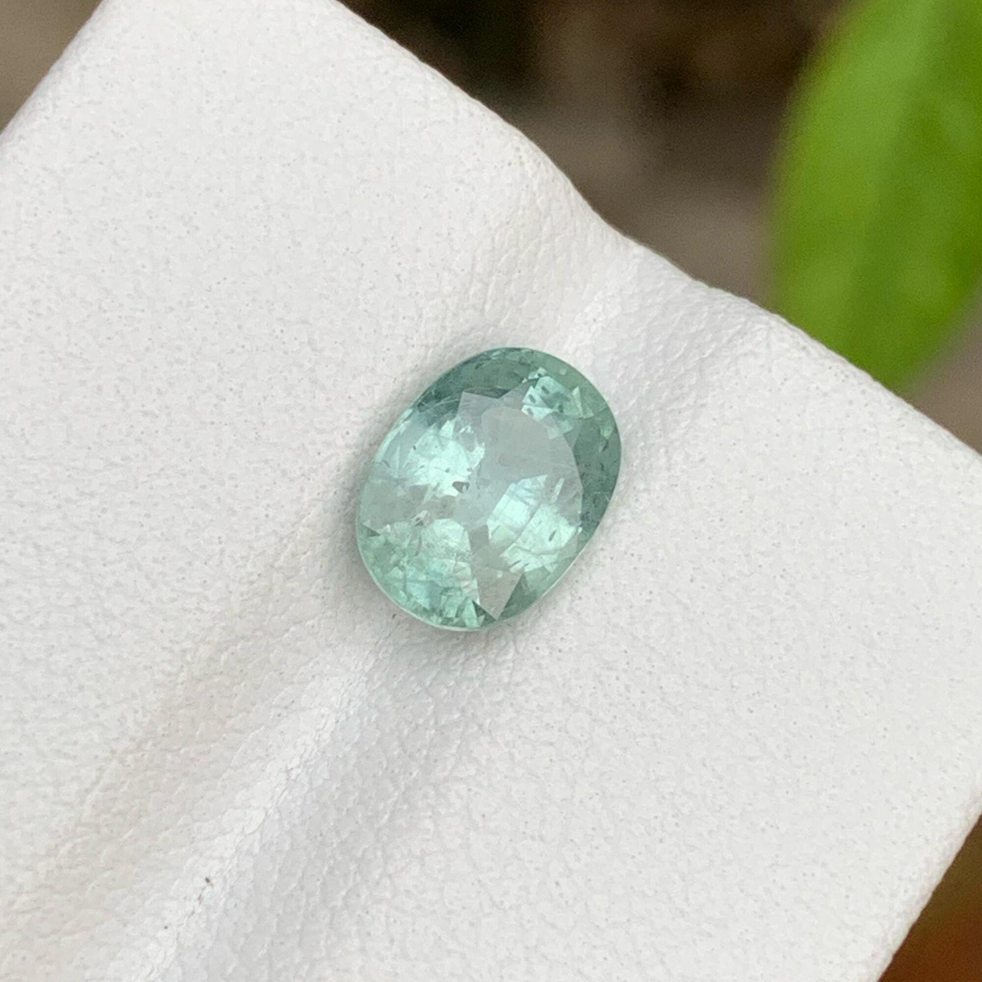 Iceberg Bi Color Sapphire: 1.95 Carat Faceted Oval Gemstone