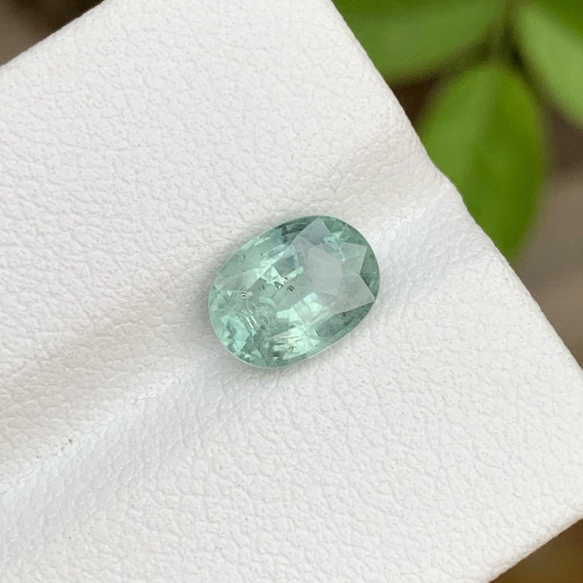 Iceberg Bi Color Sapphire: 1.95 Carat Faceted Oval Gemstone