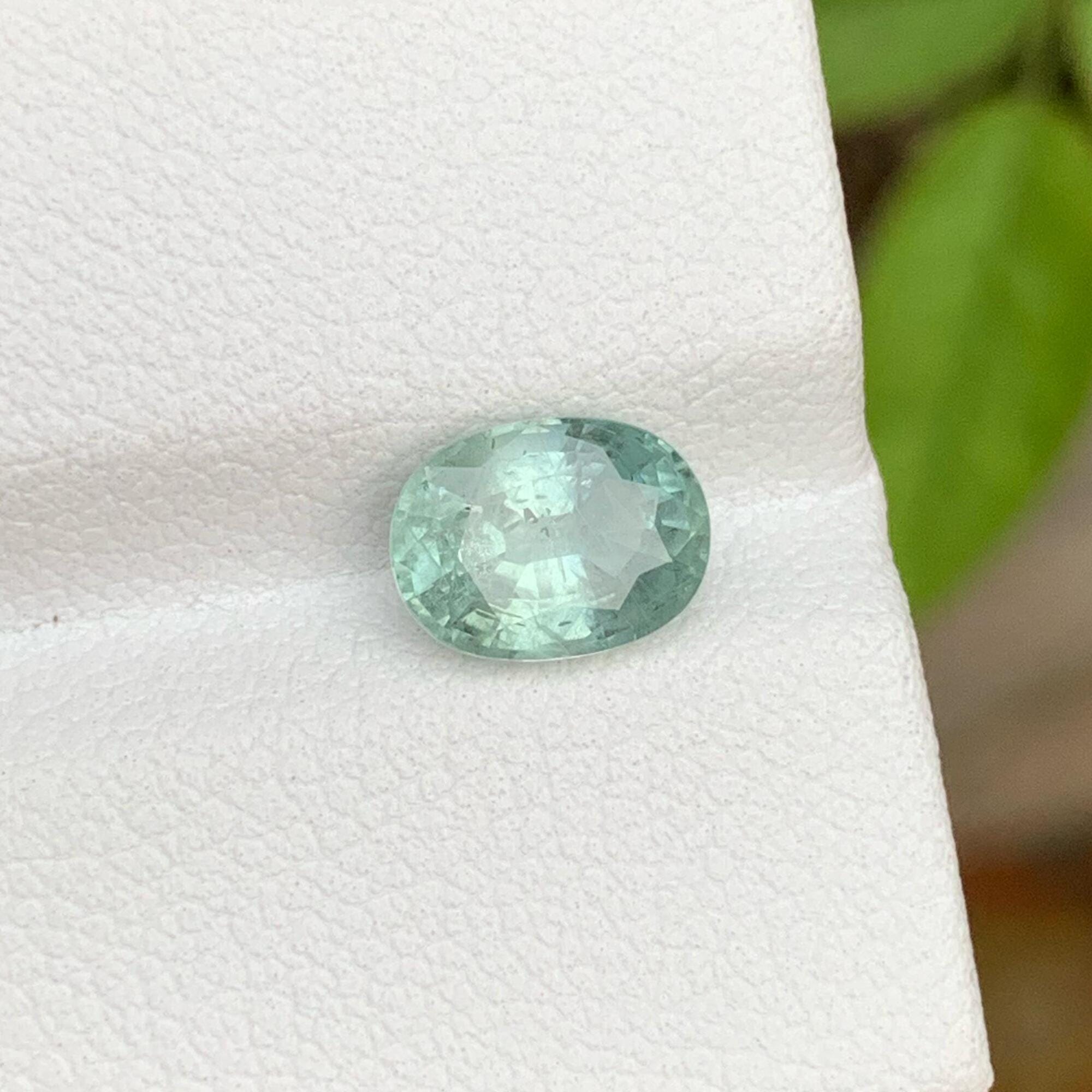 Iceberg Bi Color Sapphire: 1.95 Carat Faceted Oval Gemstone Main image