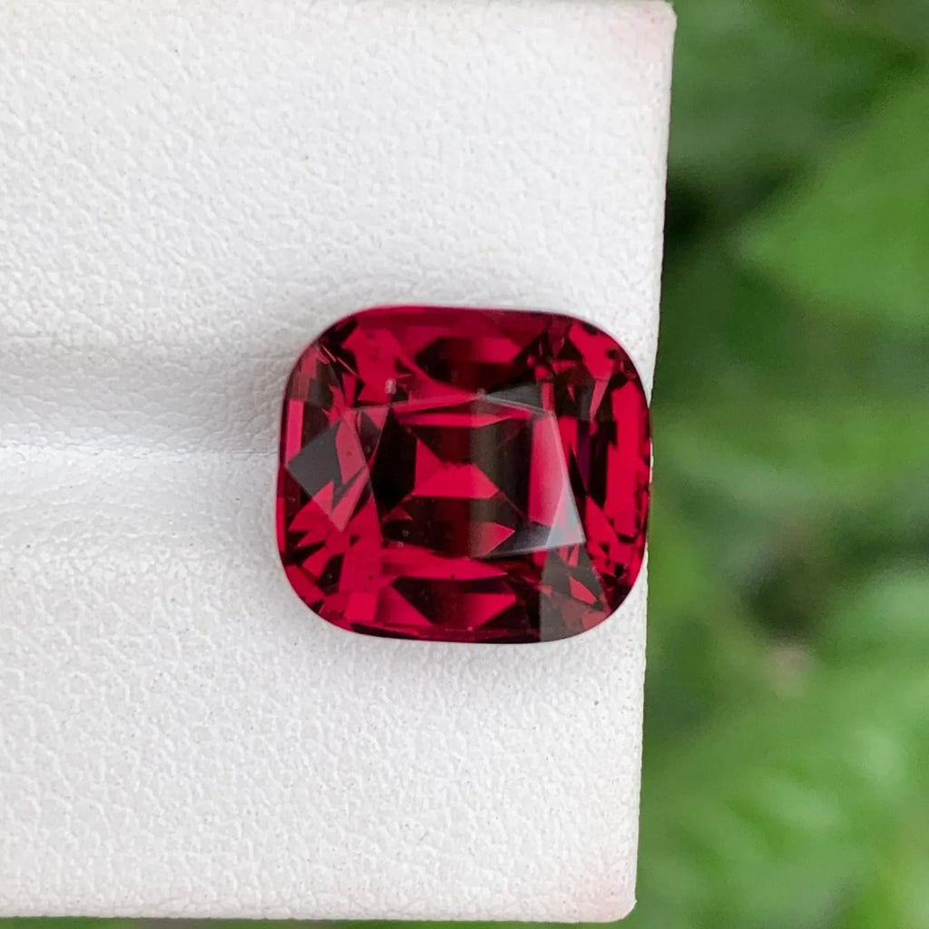 Cherry Red Garnet: 11.30 CTS Faceted Cushion Cut Gemstone - Splendor Gems