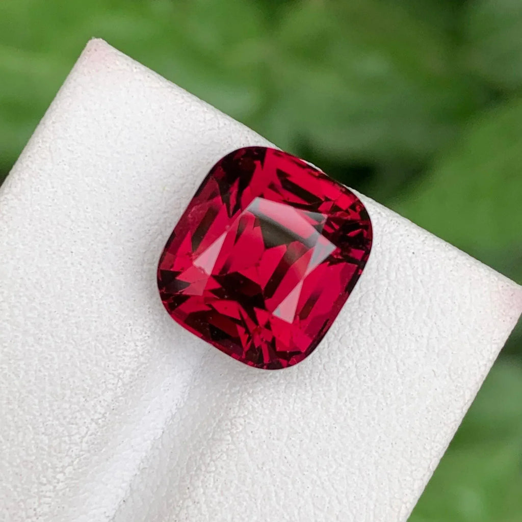 Cherry Red Garnet: 11.30 CTS Faceted Cushion Cut Gemstone - Splendor Gems