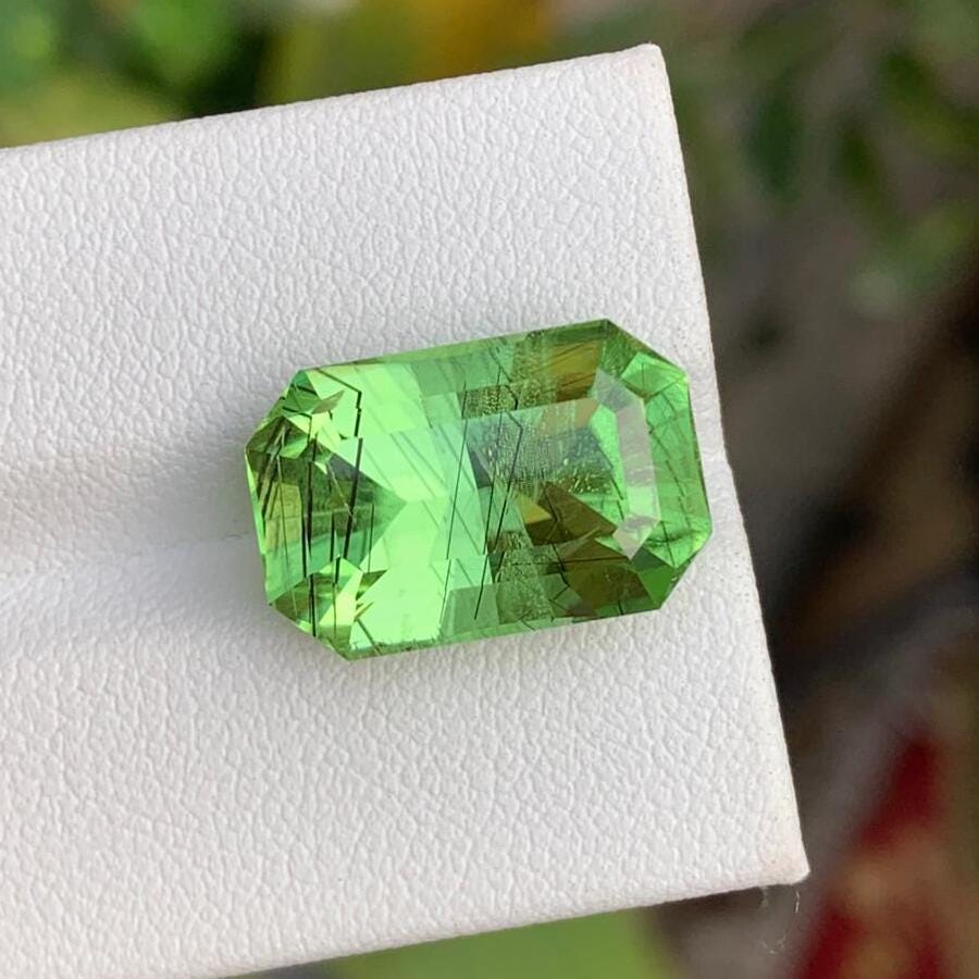 Natural Rutile Peridot Stone: Emerald Cut, 11.55 Carats, Pakistan Origin