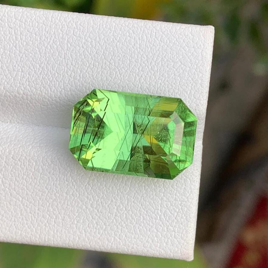Natural Rutile Peridot Stone: Emerald Cut, 11.55 Carats, Pakistan Origin Secondary image