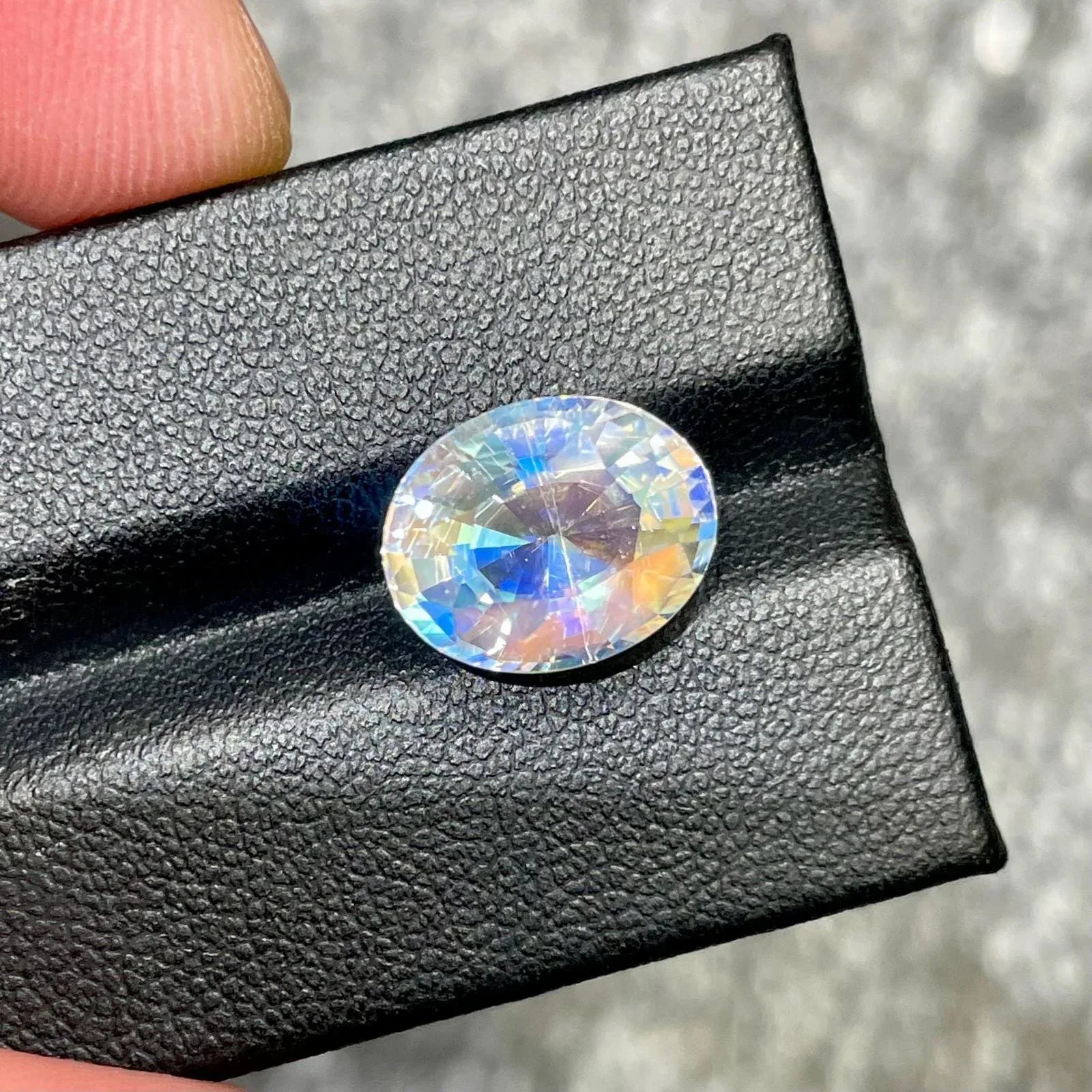 5.59 Carats Faceted Rainbow Moonstone – Oval Cut Natural Madagascar Gem - Splendor Gems